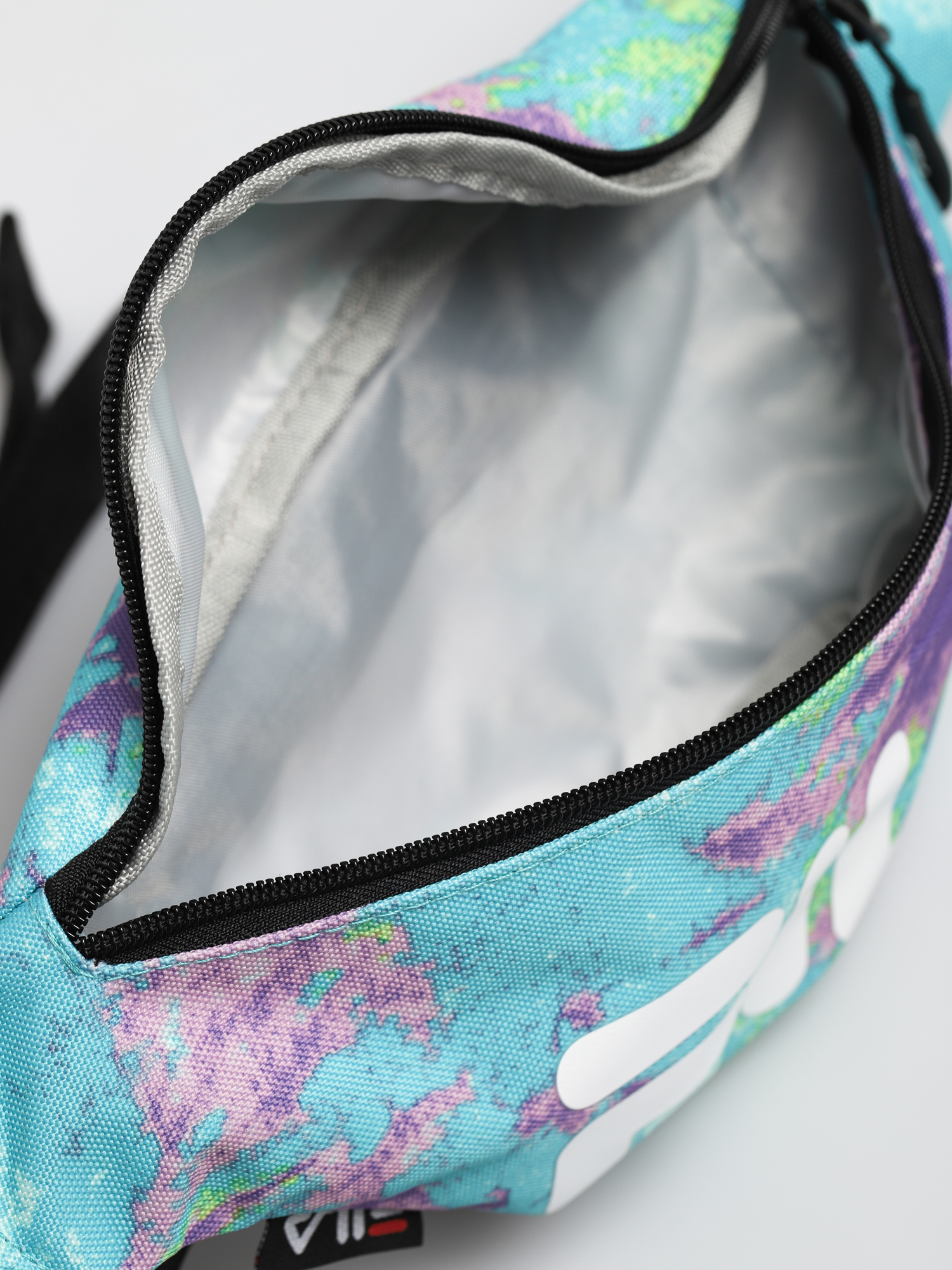 Ľadvinka Fila Waist Bag Slim Aop (lilac batik allover)