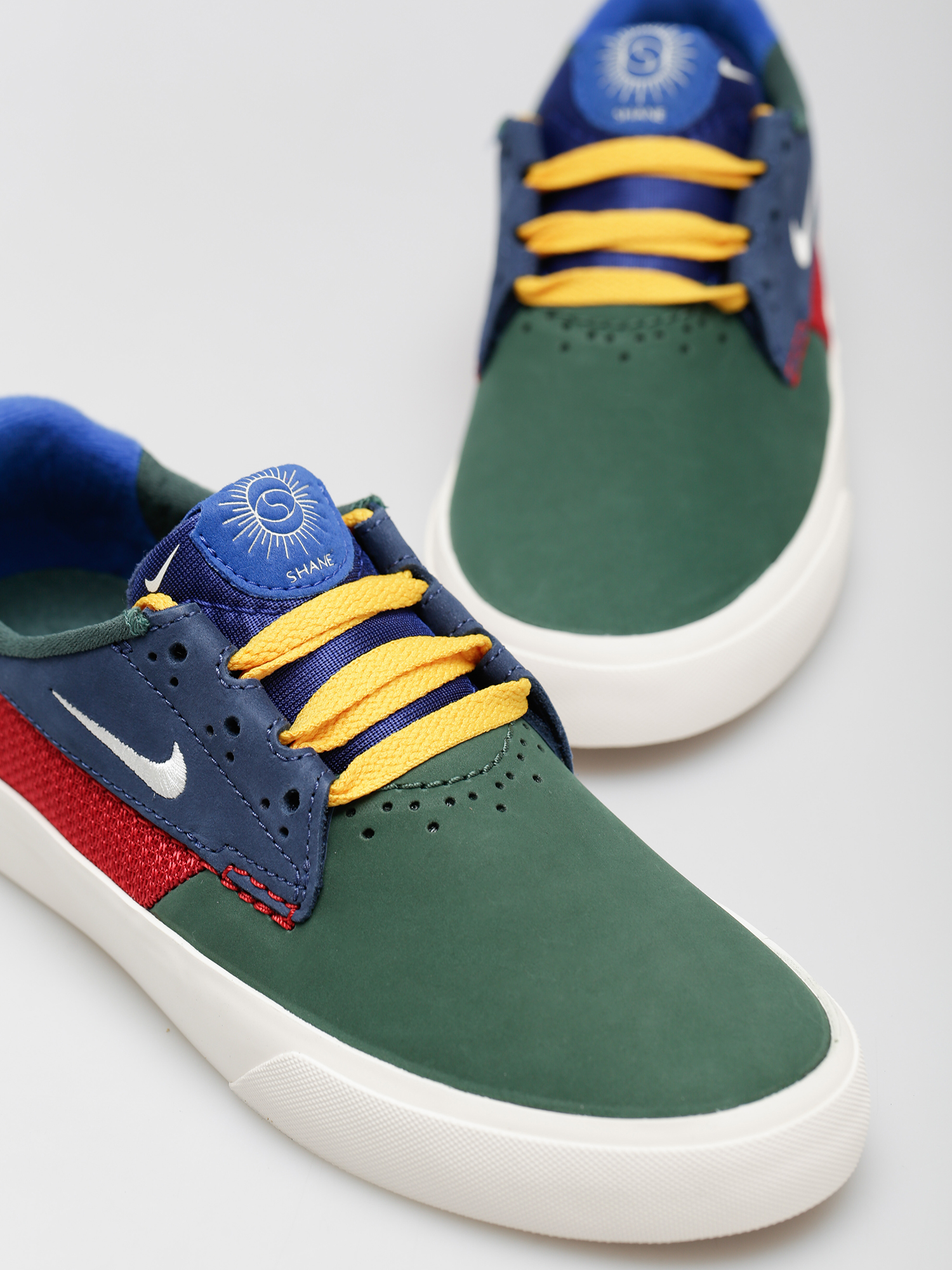 Topánky Nike SB Shane (noble green/sail varsity red navy)
