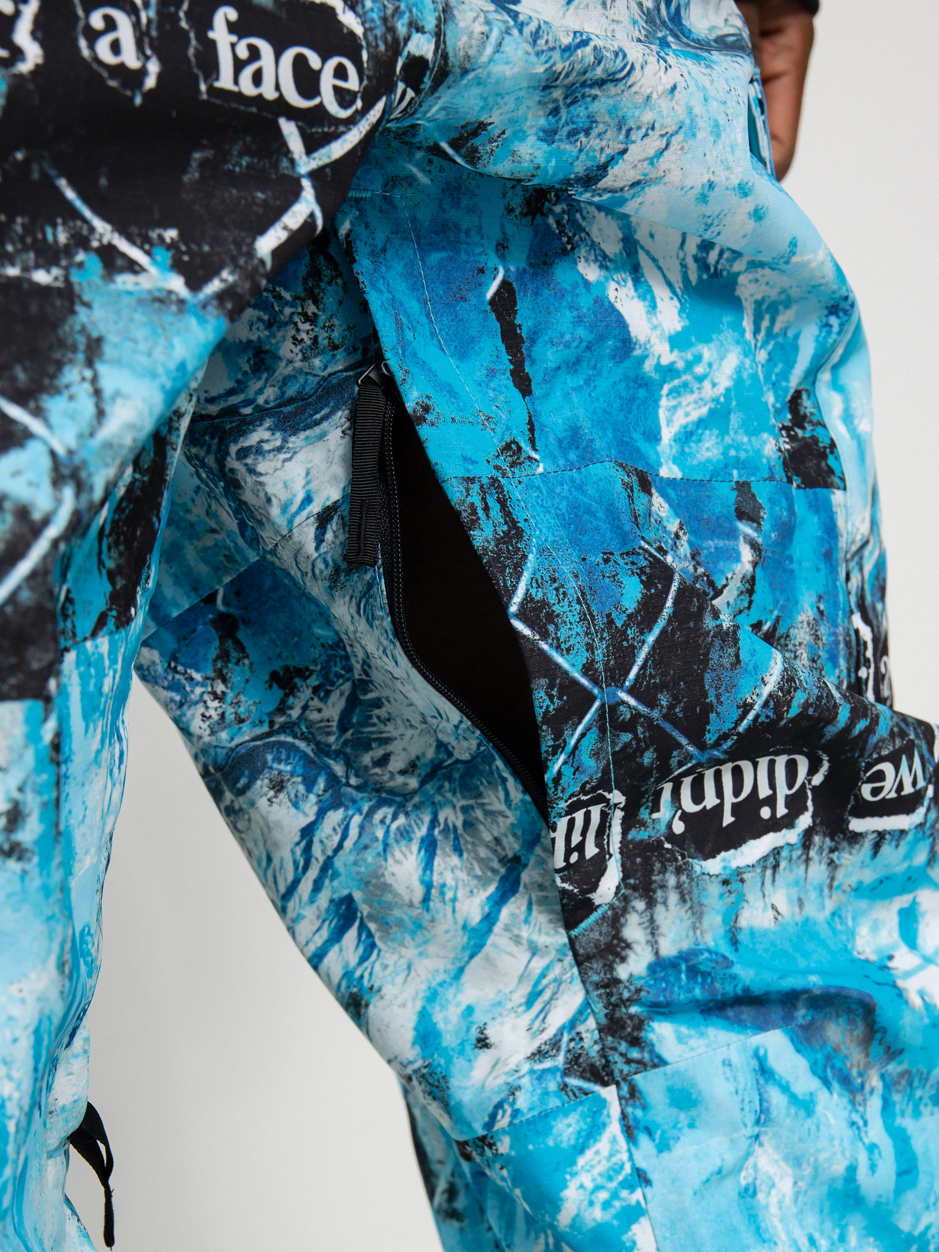 Pánske Snowboardové nohavice The North Face Printed Dragline Bib (norse blue/cole navin/never a face print)