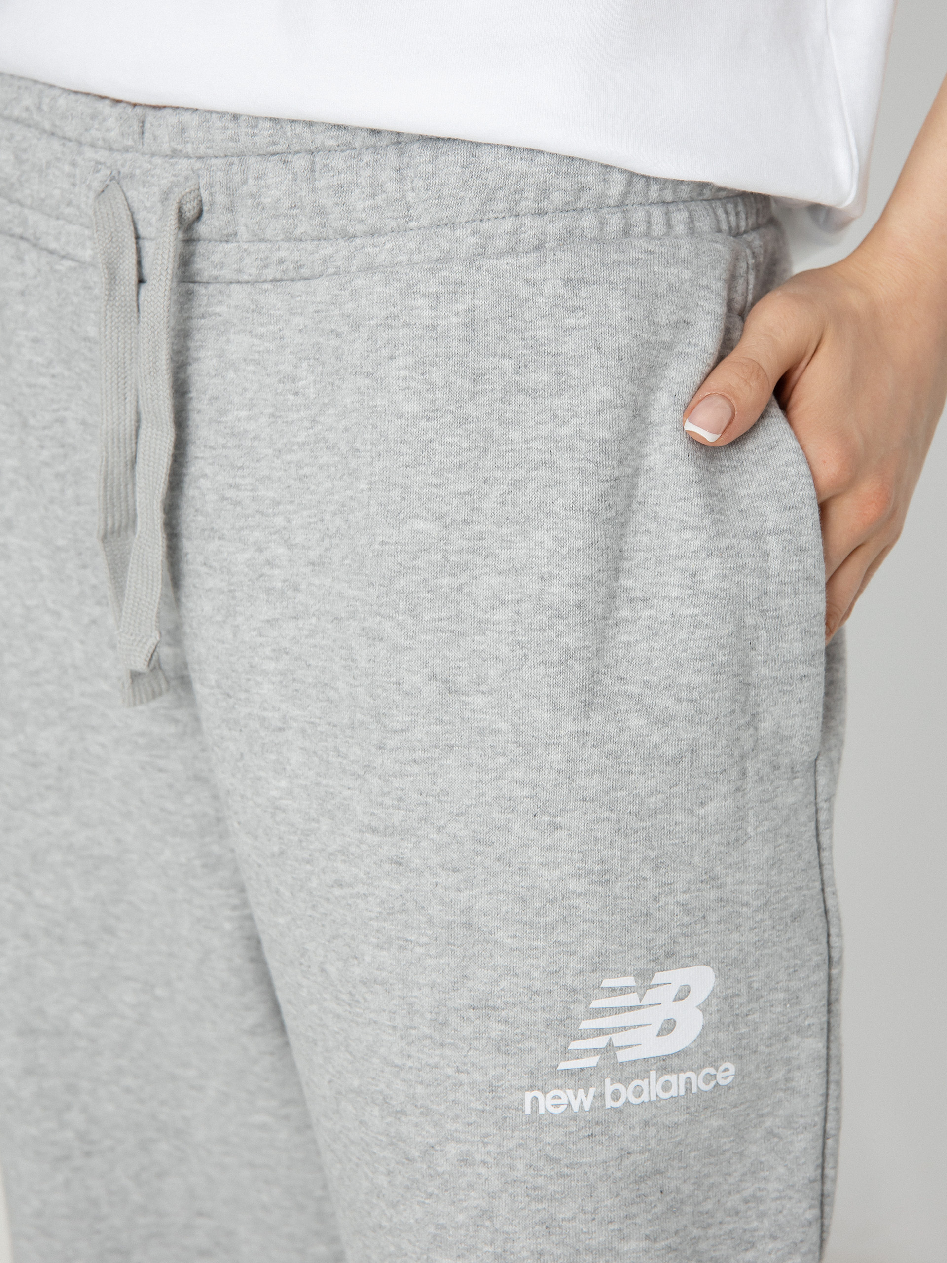 Nohavice New Balance Essentials Wide Wmn (nbnavy)