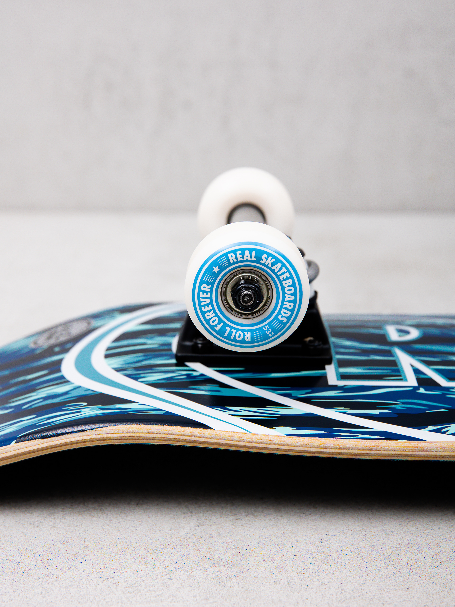 Skateboard Real Stealth Ovals (black/blue)