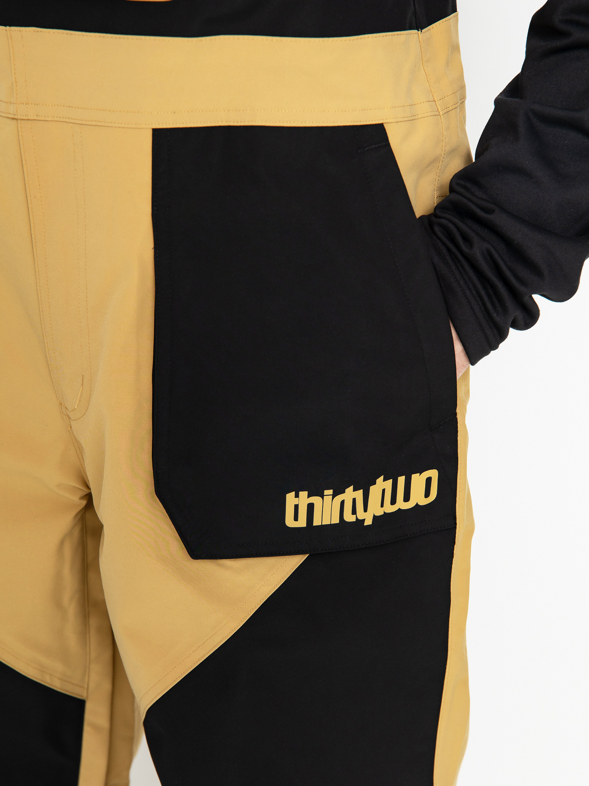 Pánske Snowboardové nohavice ThirtyTwo Basement Bib (black/tan)