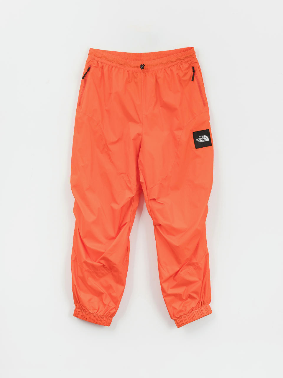 Nohavice The North Face X Yinka Ilori Windshell (red orange)