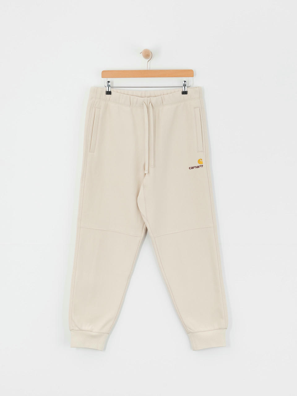 Nohavice Carhartt WIP American Script Jogging (moonbeam)