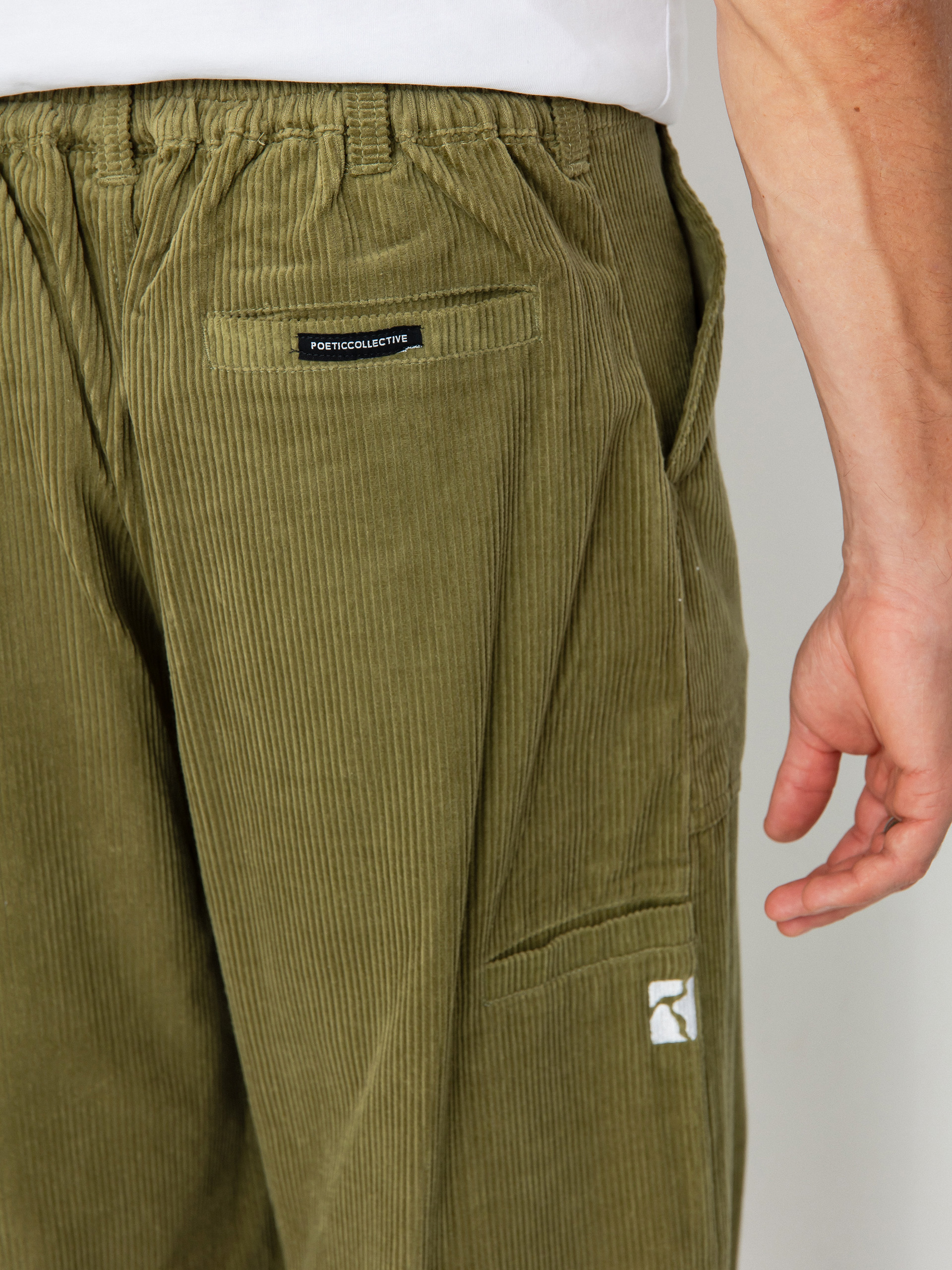 Nohavice Poetic Collective Painter (olive corduroy)