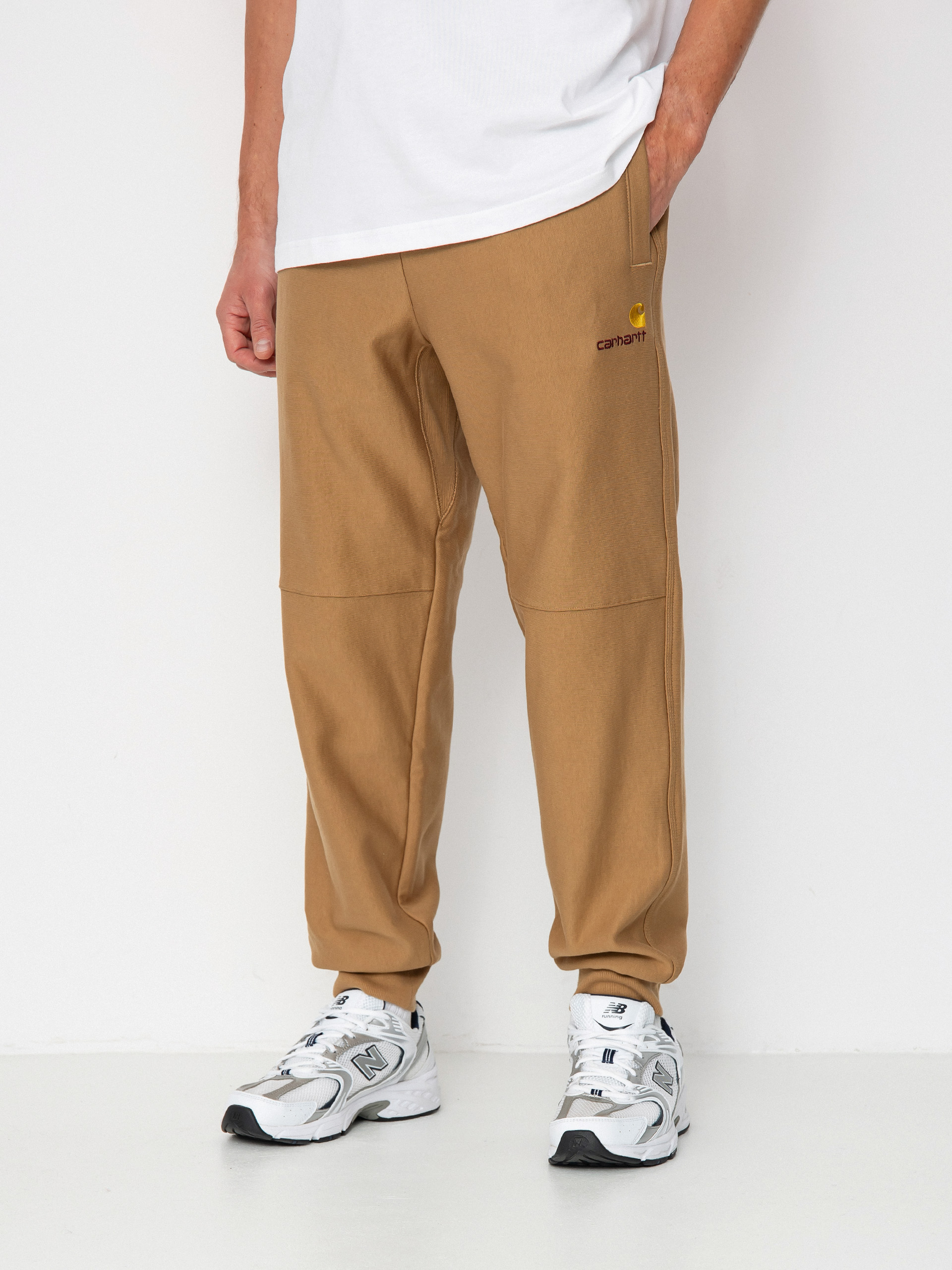 Nohavice Carhartt WIP American Script Jogging (peanut)