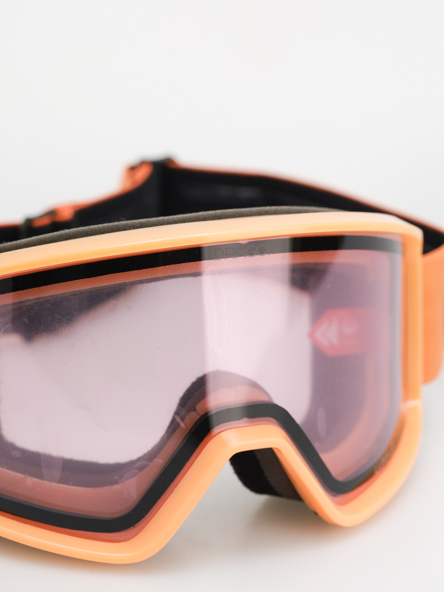 Snowboardové okuliare Dragon DXT OTG (apricot/lumalens light rose)