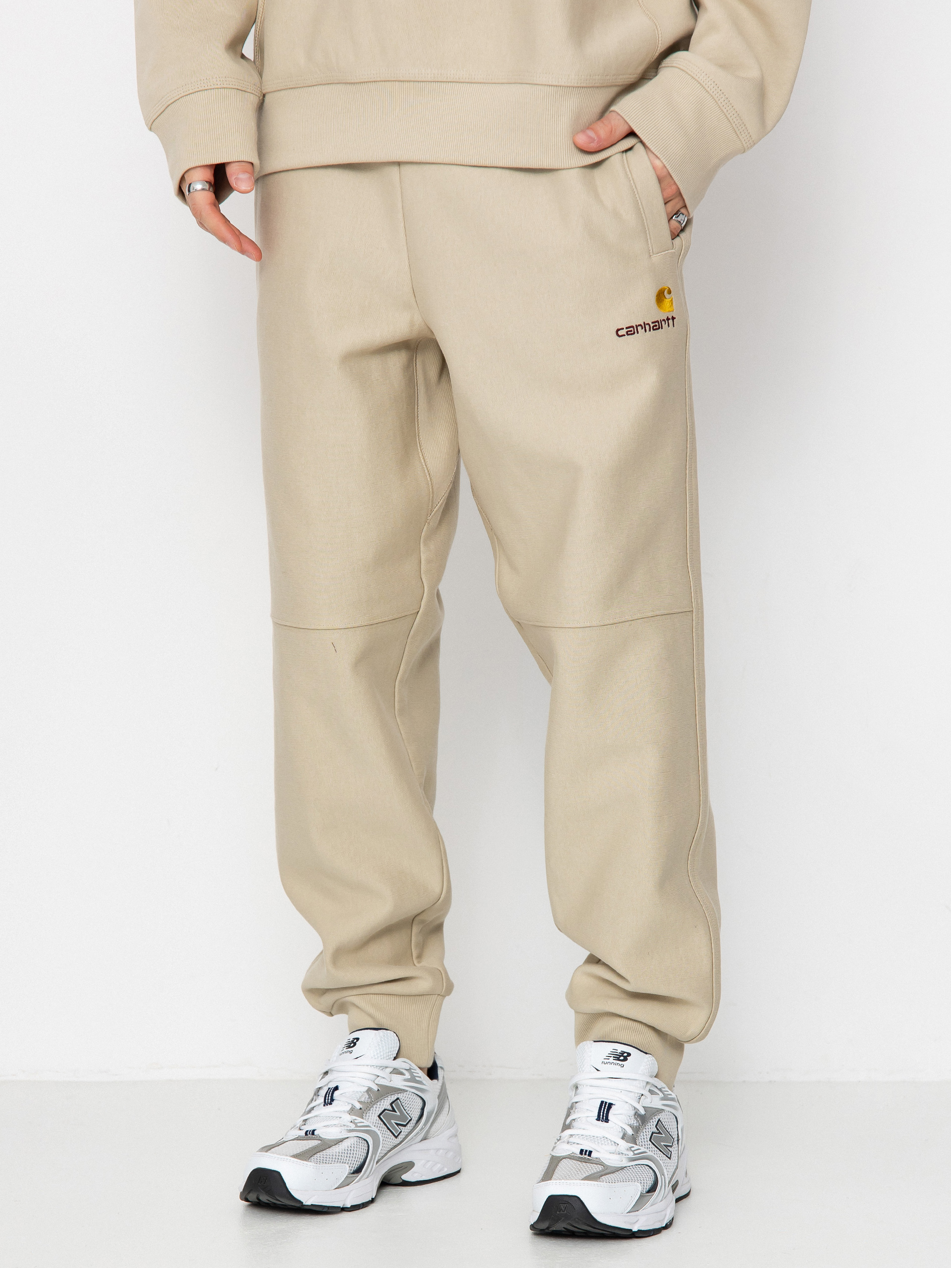 Nohavice Carhartt WIP American Script Jogging (fleur de sel)