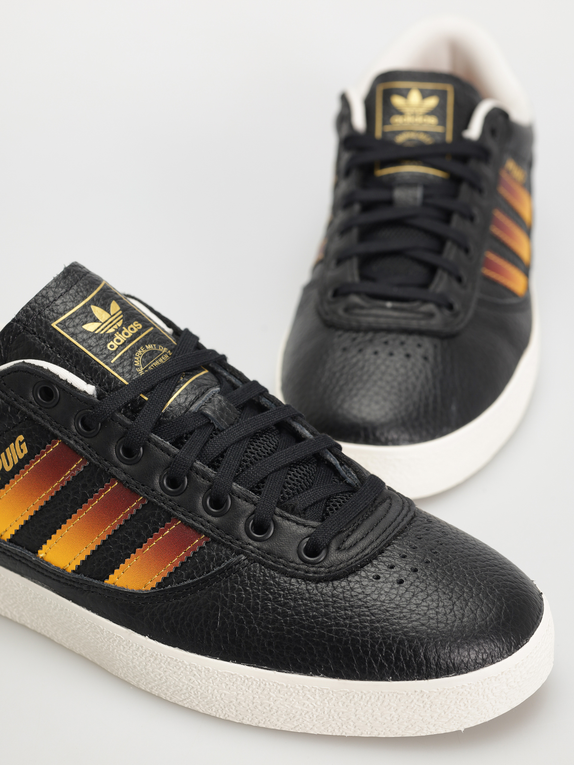 Topánky adidas Puig Indoor (cblack/shared/creyel)