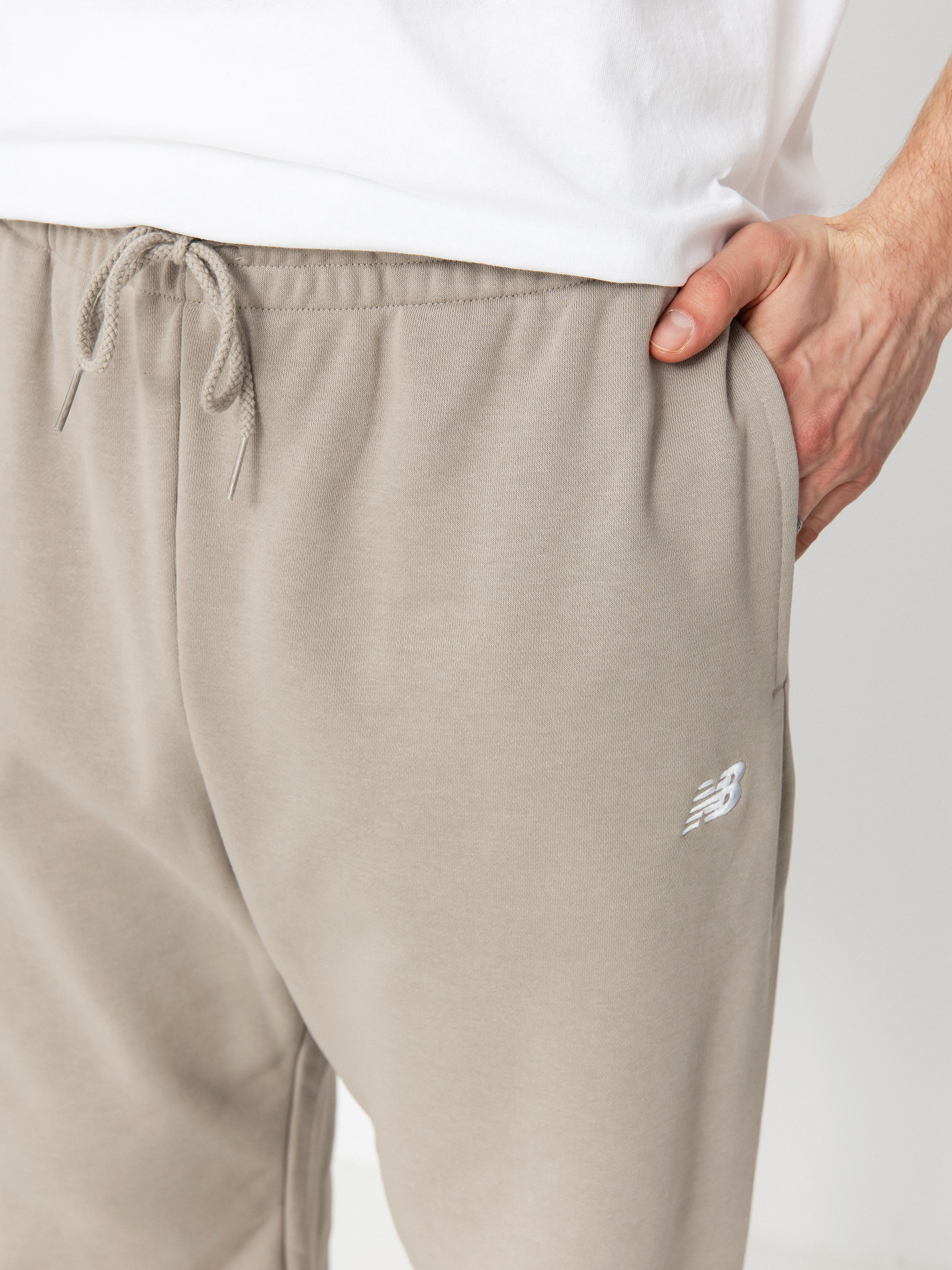 Nohavice New Balance Sport Essentials French (aridston)
