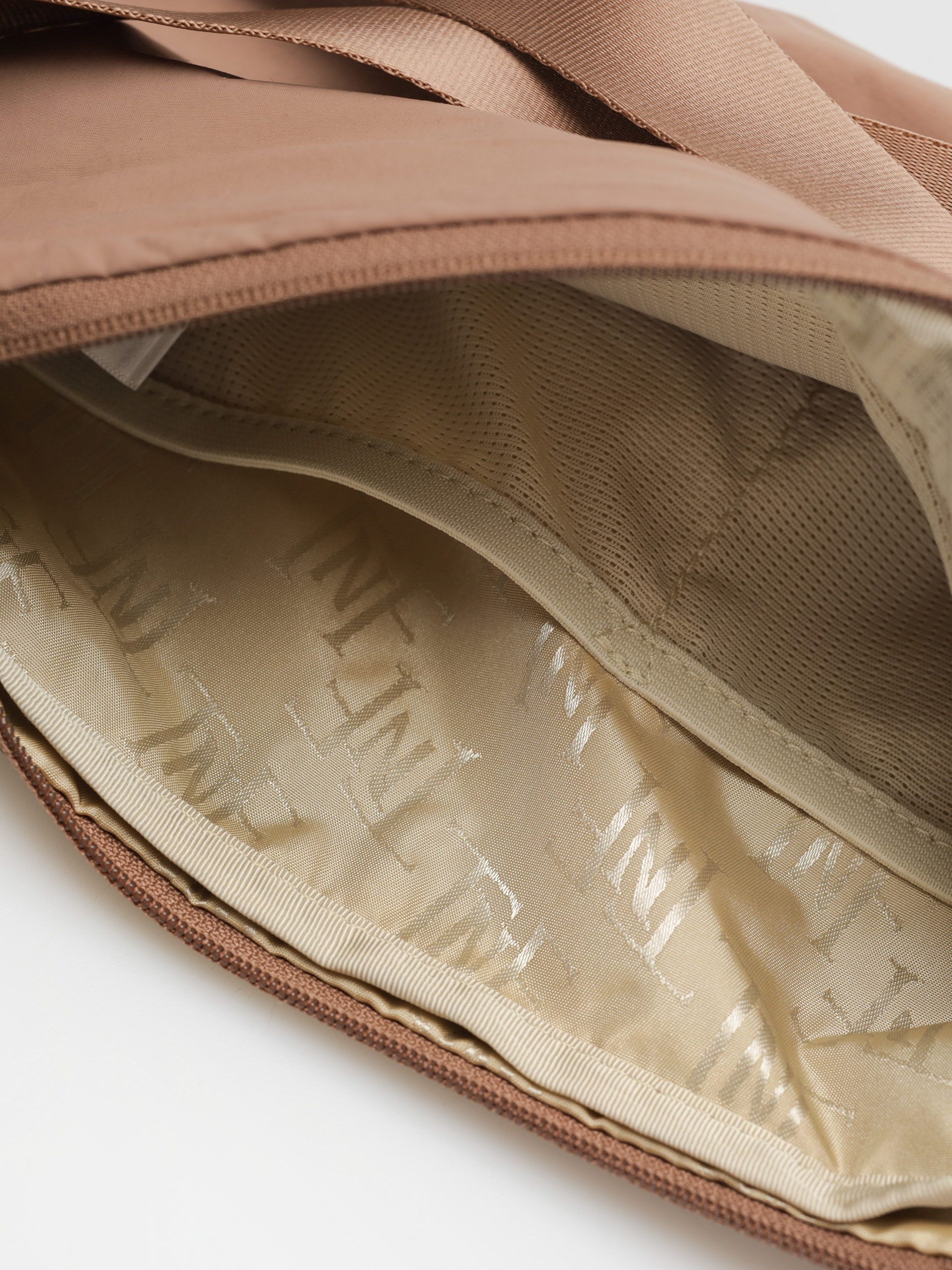Kabelka The North Face Never Stop Crossbody Wmn (latte)