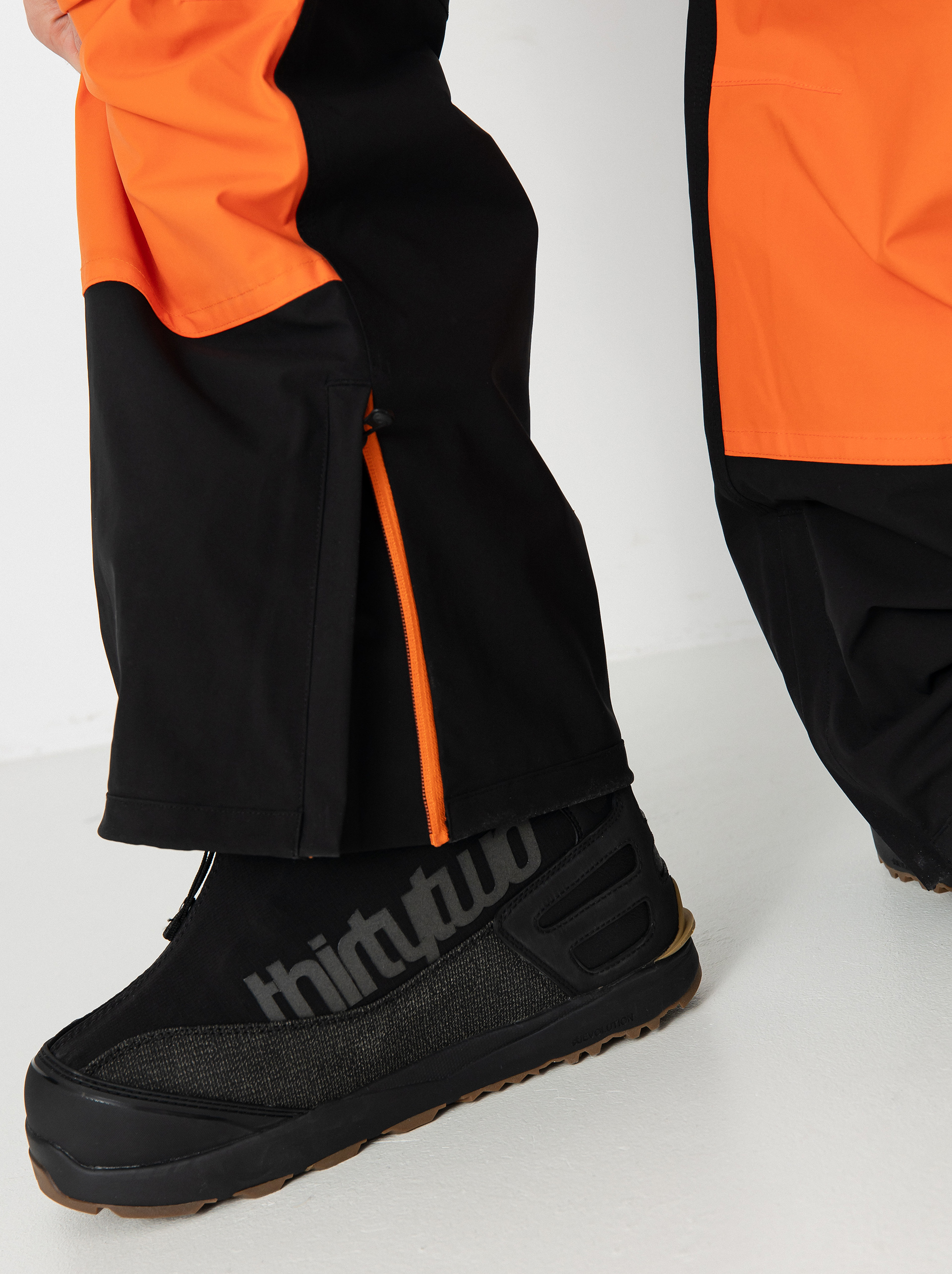 Pánske Snowboardové nohavice ThirtyTwo Basement Bib (black/orange)