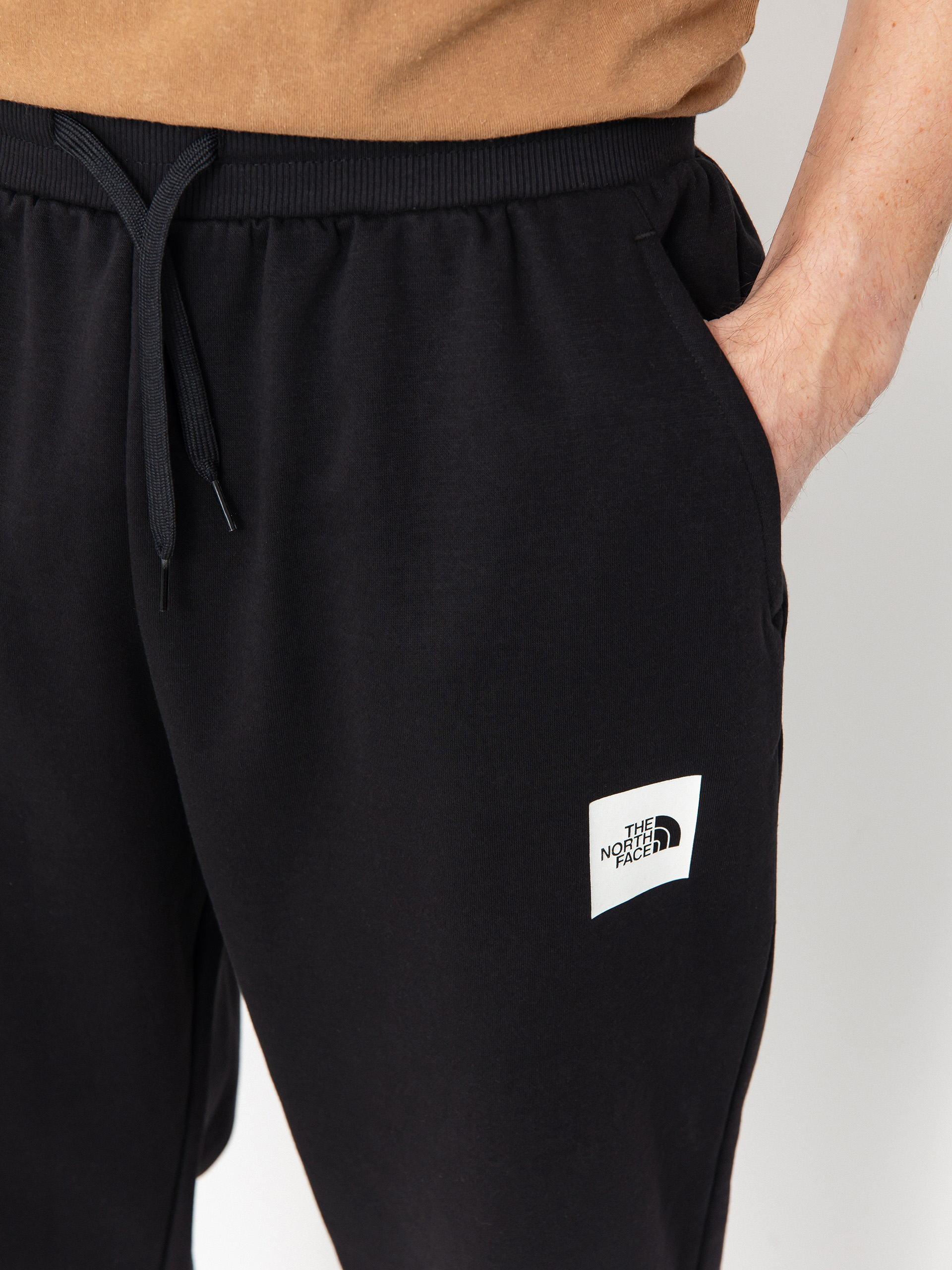 Nohavice The North Face Fine Regular Tapered Jogger (tnf black)