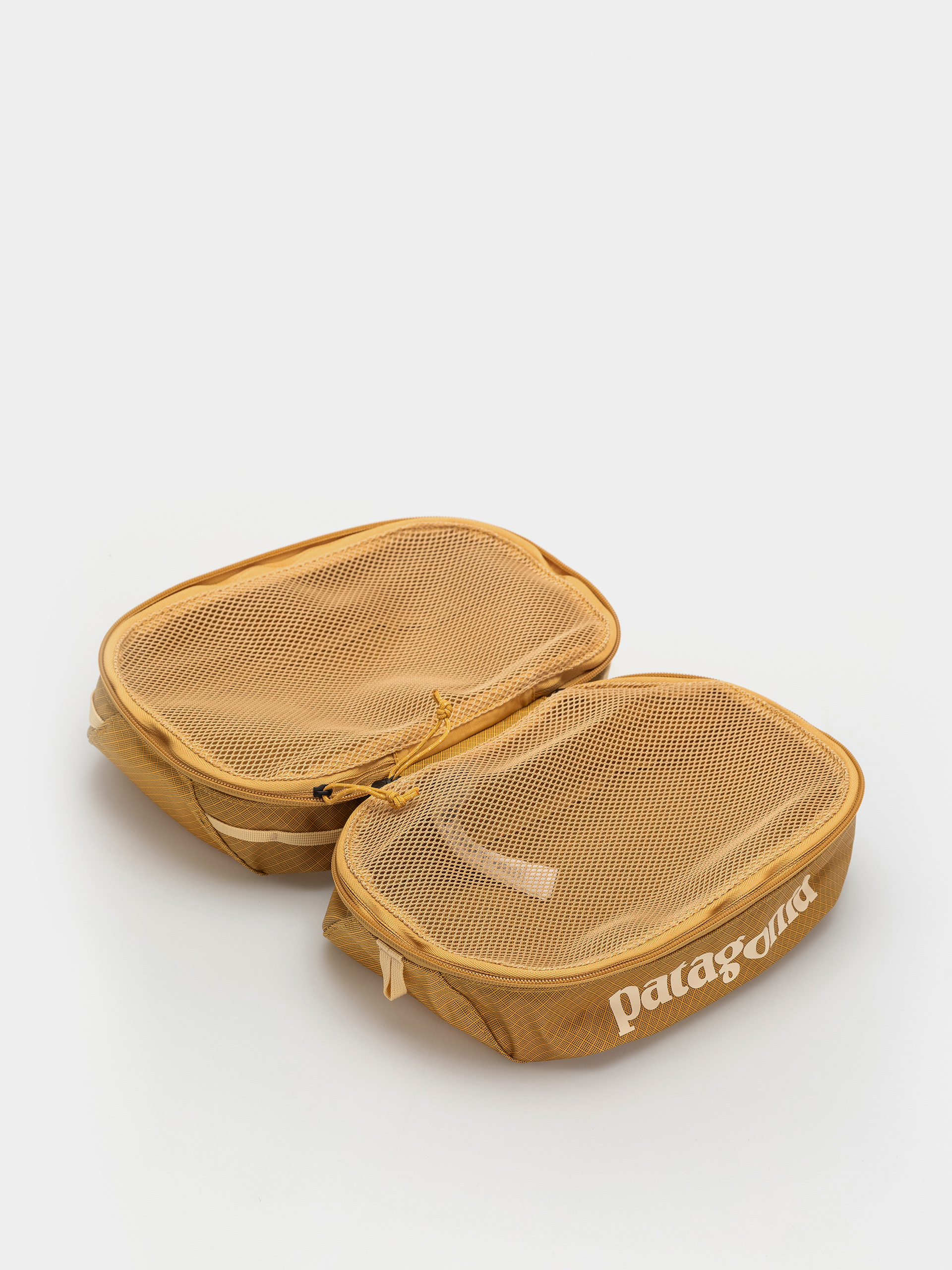 Kosmetická taška Patagonia Black Hole Cube 6L (pufferfish gold w/beeswax tan)