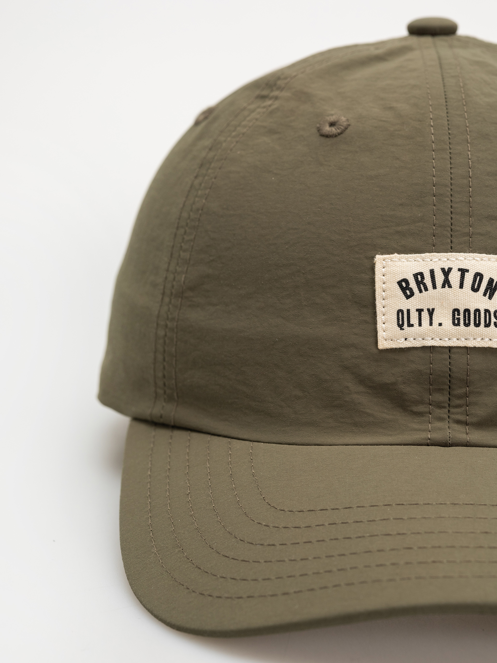 Šiltovka Brixton Woodburn Lp Adj (ivy green nylon)