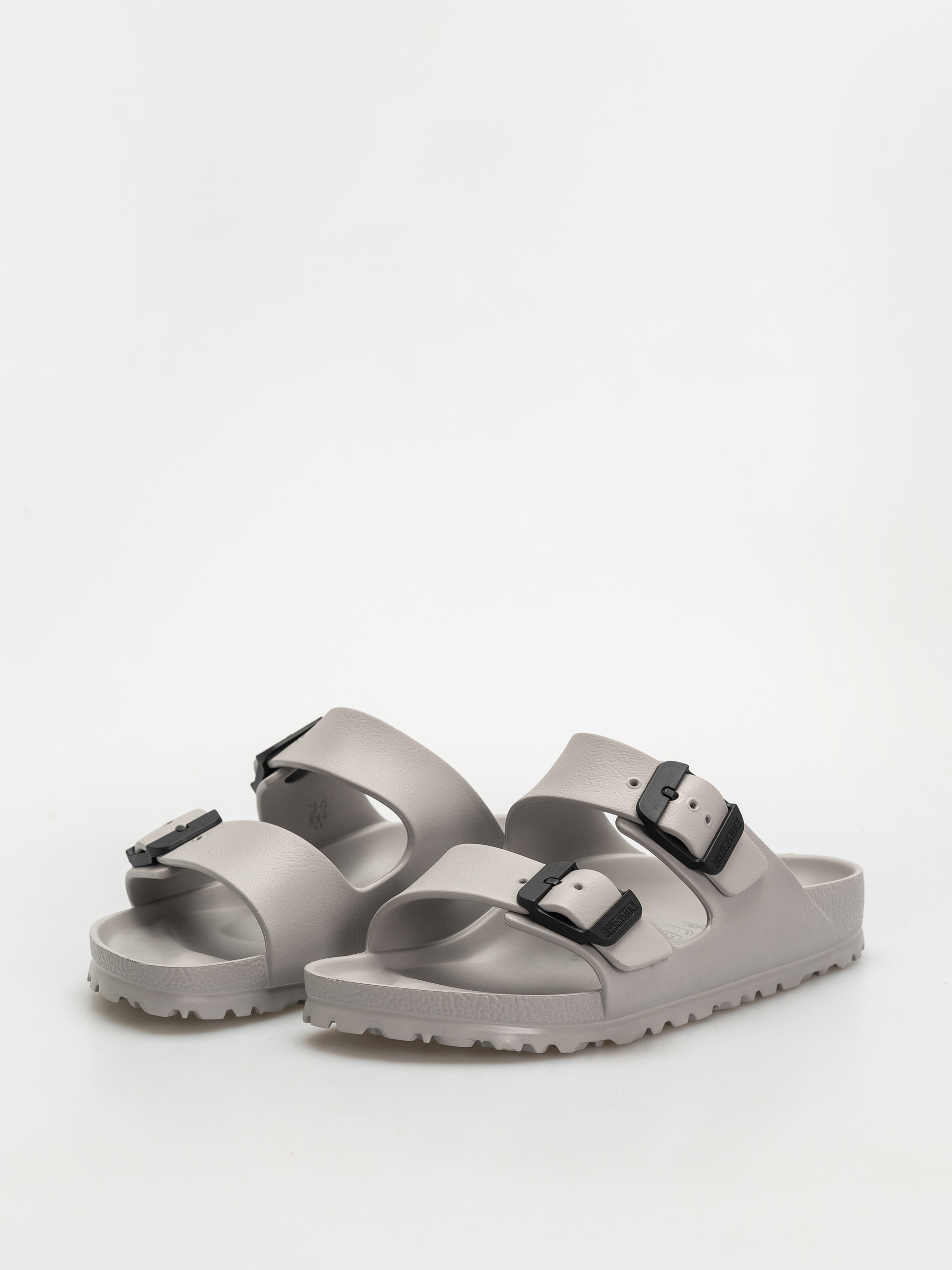 Šľapky Birkenstock Arizona Stealth Buckle EVA Narrow Wmn (stone coin/black)