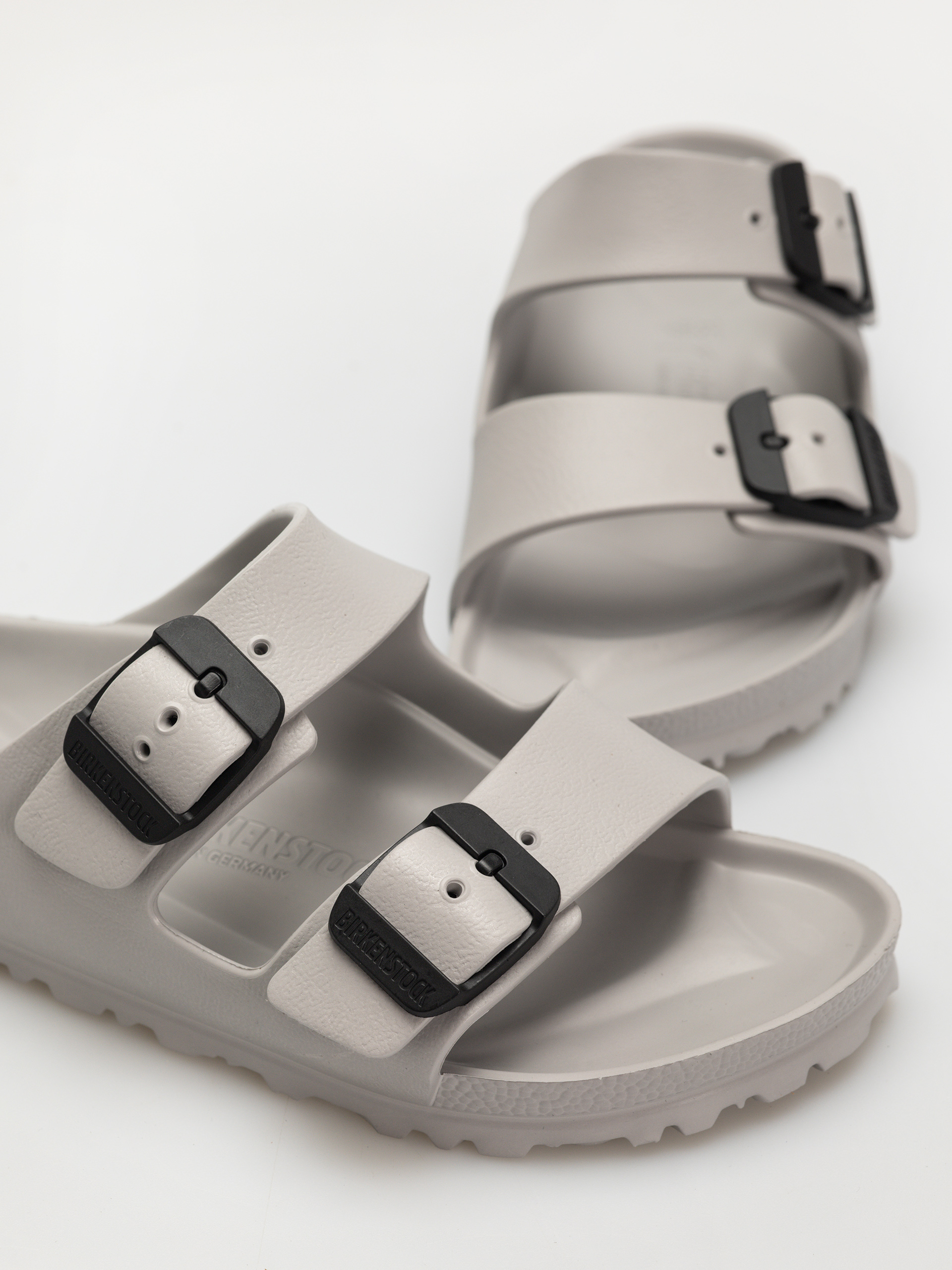Šľapky Birkenstock Arizona Stealth Buckle EVA Narrow Wmn (stone coin/black)