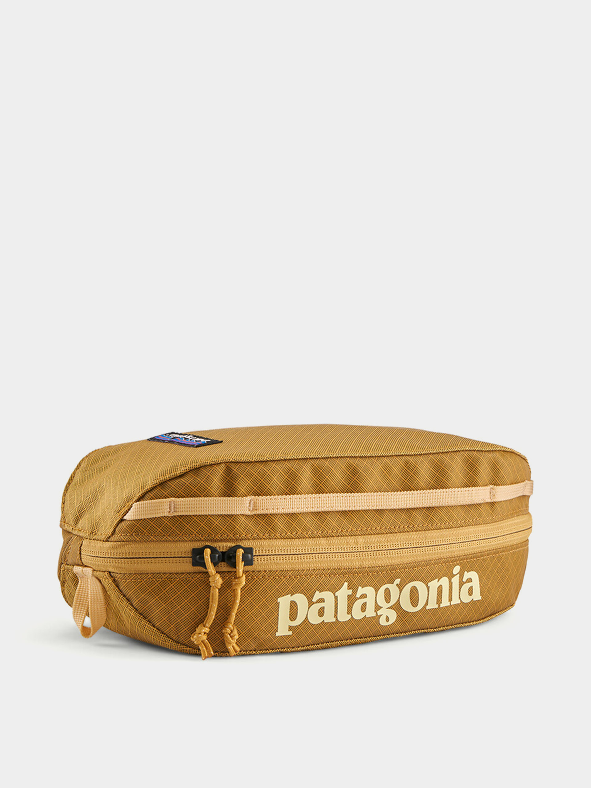 Kosmetická taška Patagonia Black Hole Cube 3L (pufferfish gold w/beeswax tan)