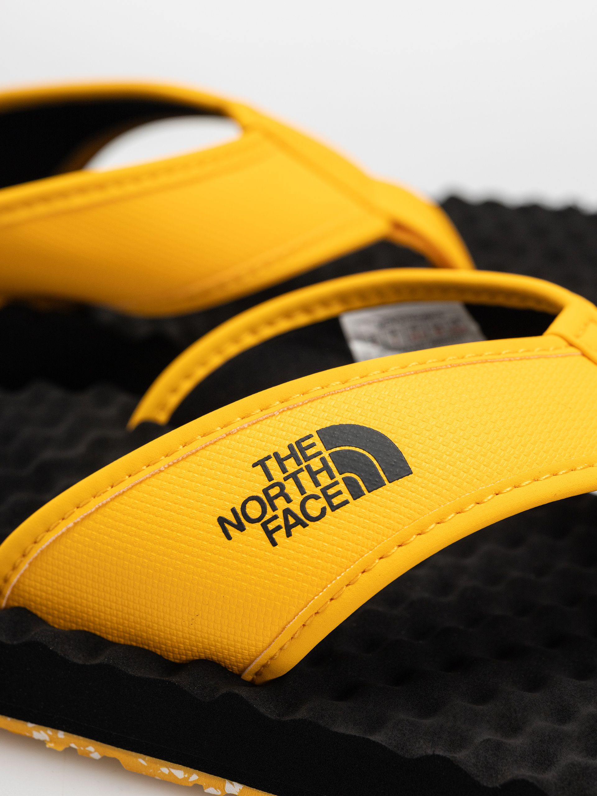 Plážovky The North Face Base Camp Flip Flop II (summit gold/tnf black)