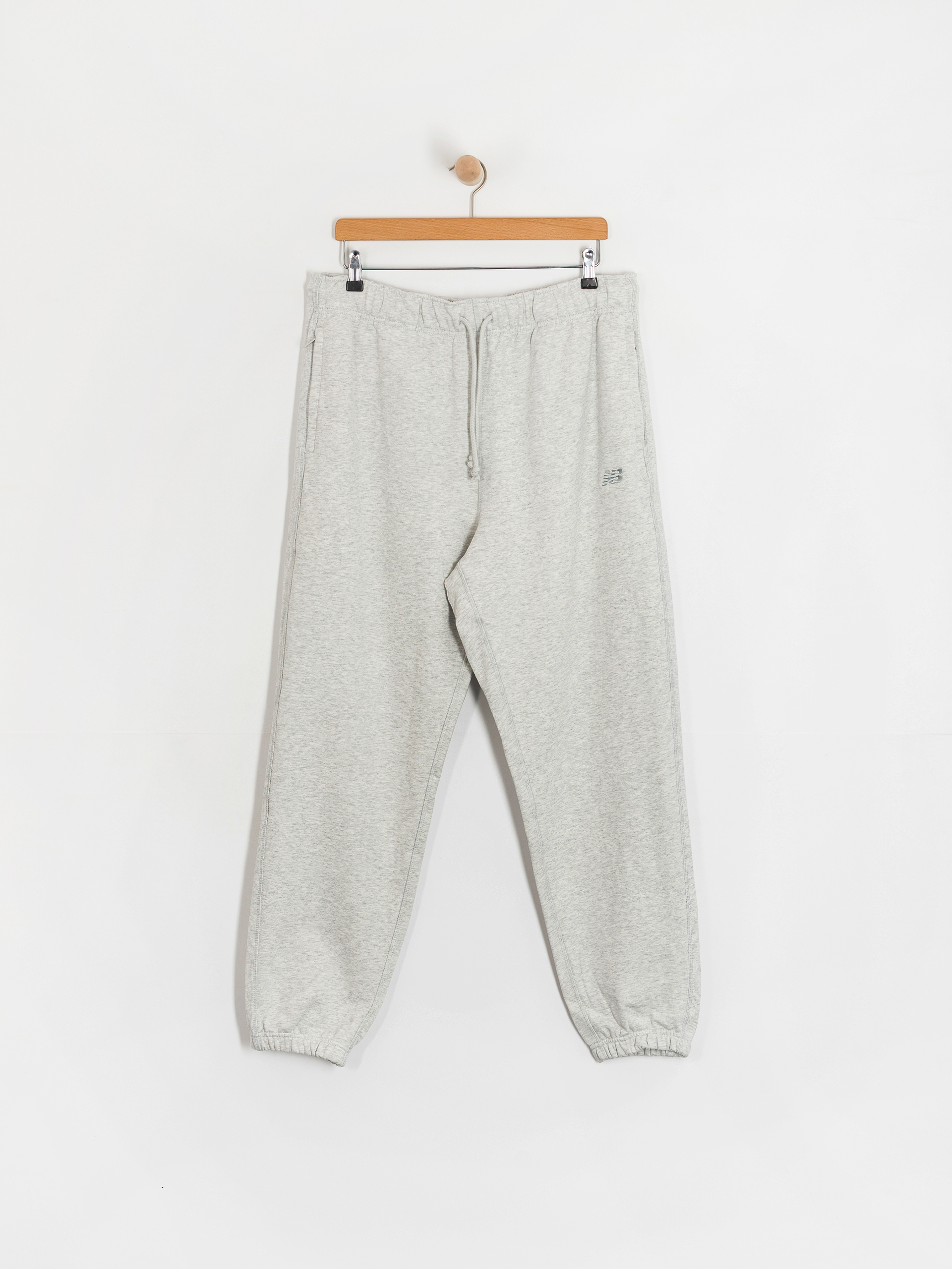Nohavice New Balance Athletics Jogger (grey)