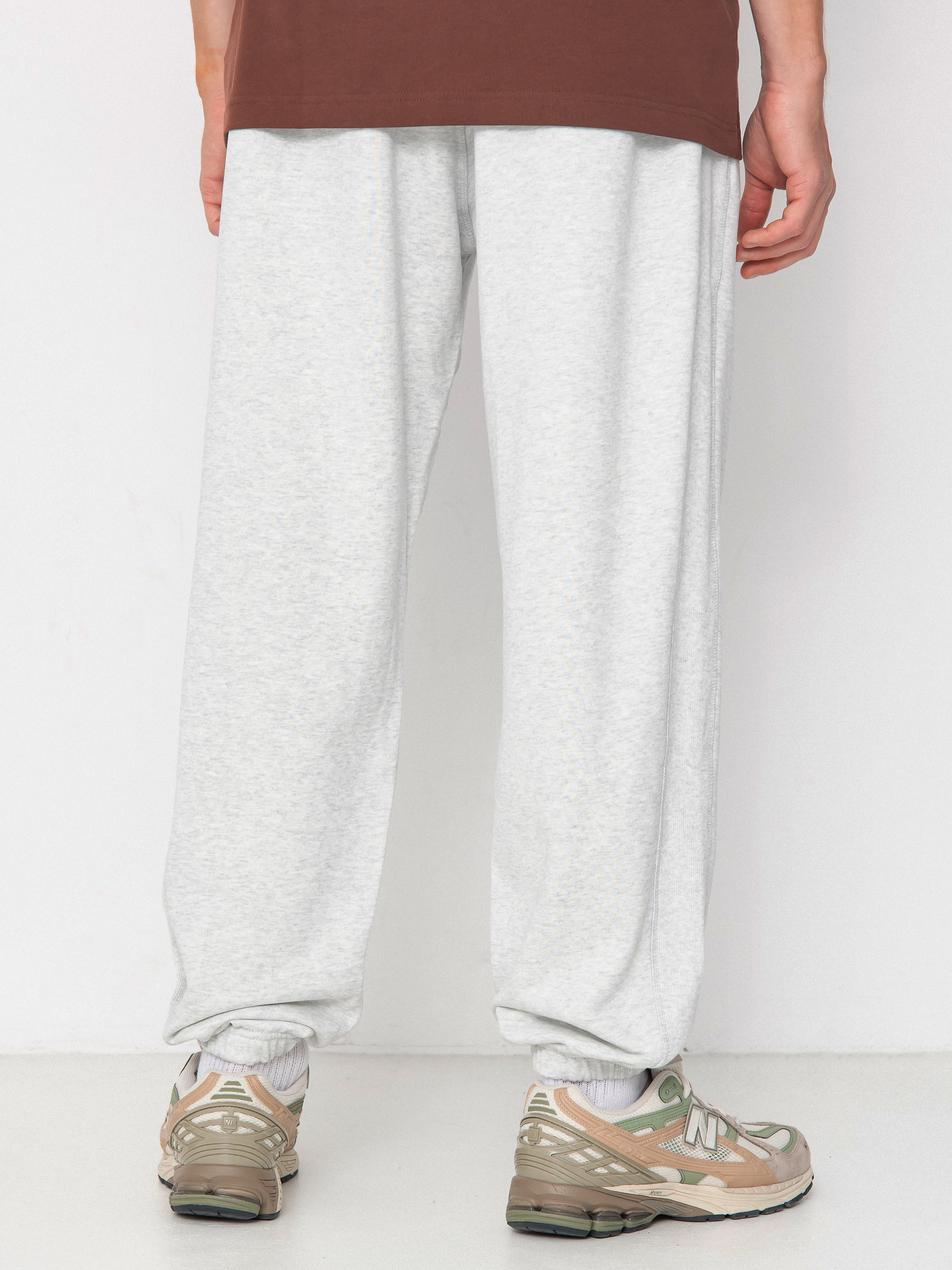 Nohavice New Balance Athletics Jogger (grey)