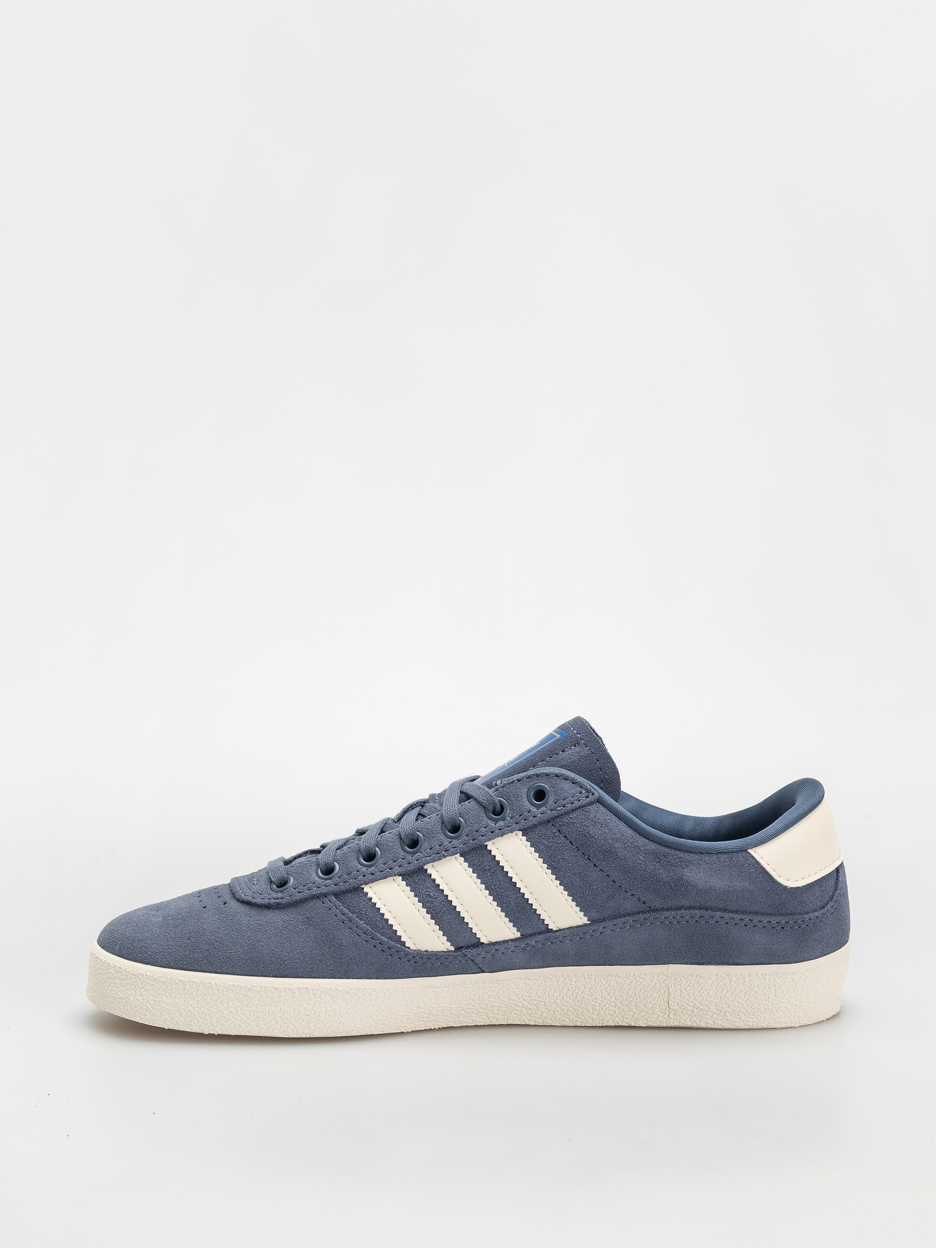 Topánky adidas Puig Indoor (prloin/owhite/blubir)