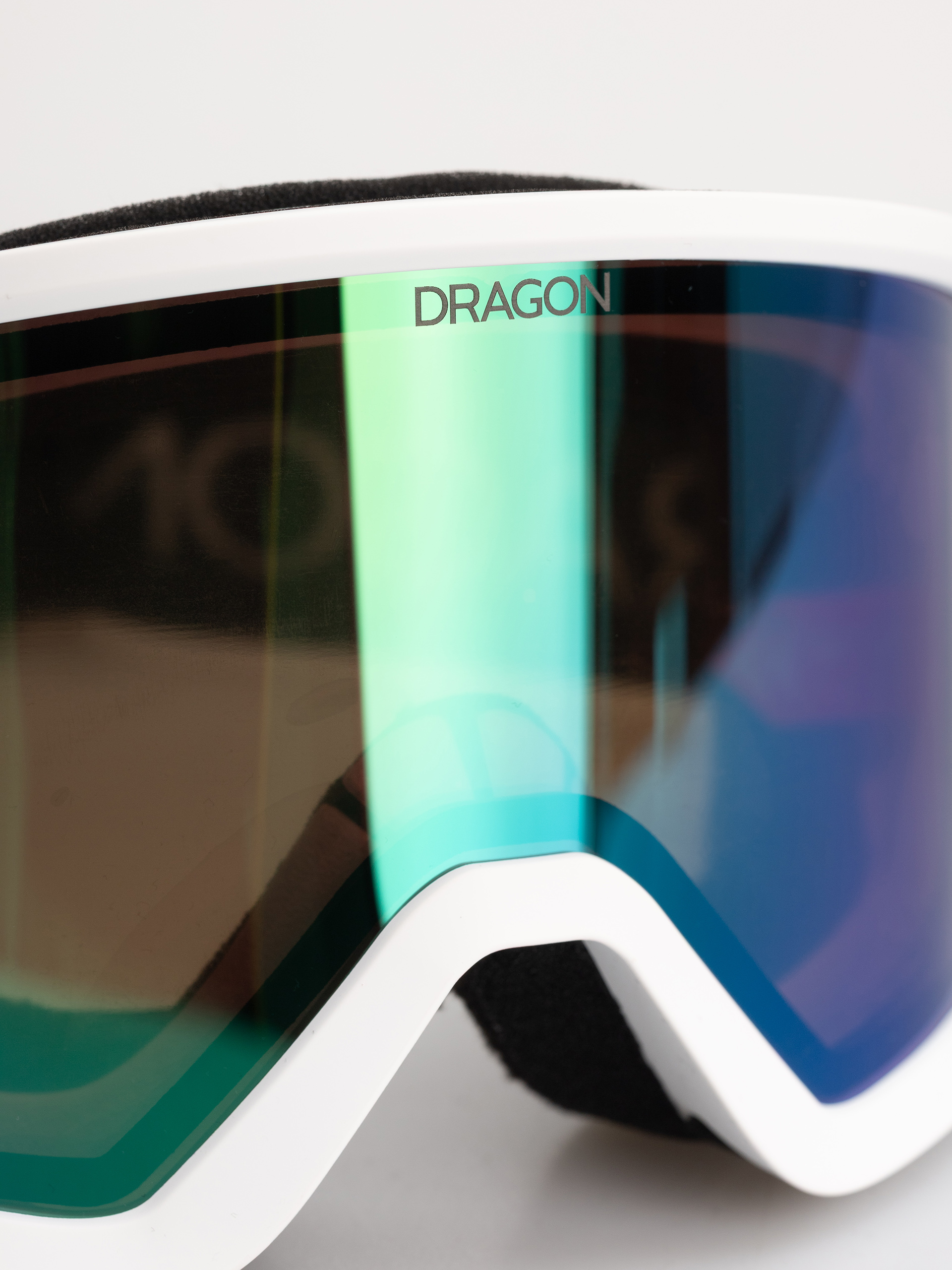 Snowboardové okuliare Dragon DX3 OTG (white/lumalens green ion)