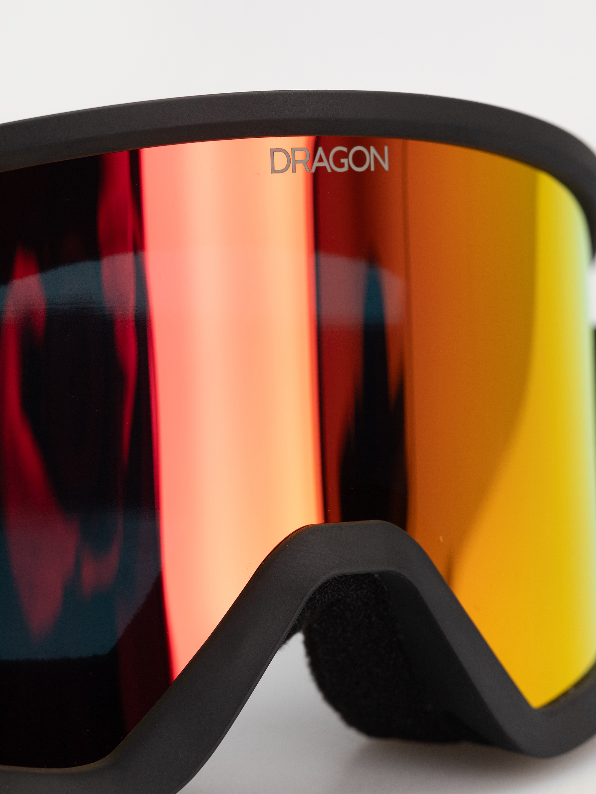 Snowboardové okuliare Dragon DX3 OTG (black/lumalens red ion)