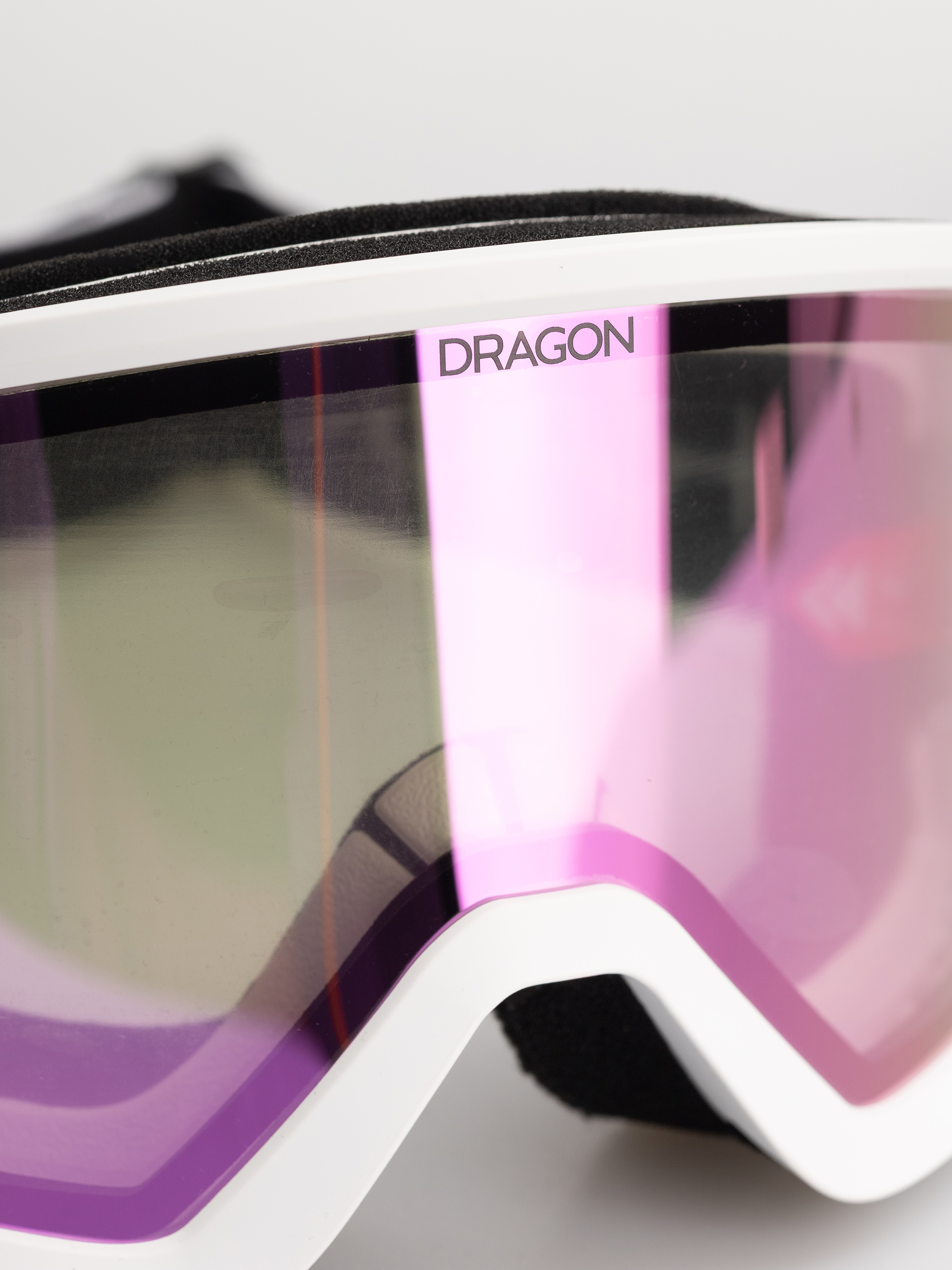 Snowboardové okuliare Dragon DX3 OTG (white/lumalens pink ion)