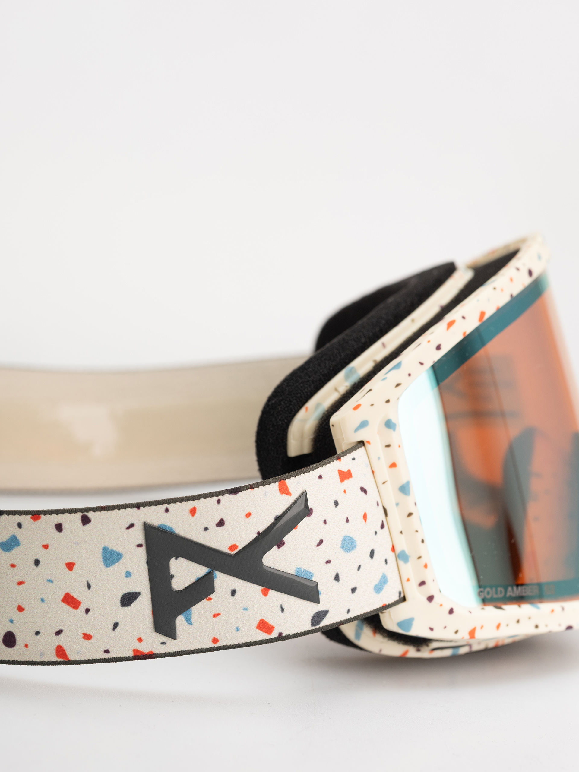 Snowboardové okuliare Anon Tracker 2.0 JR (speckles/gold amber)