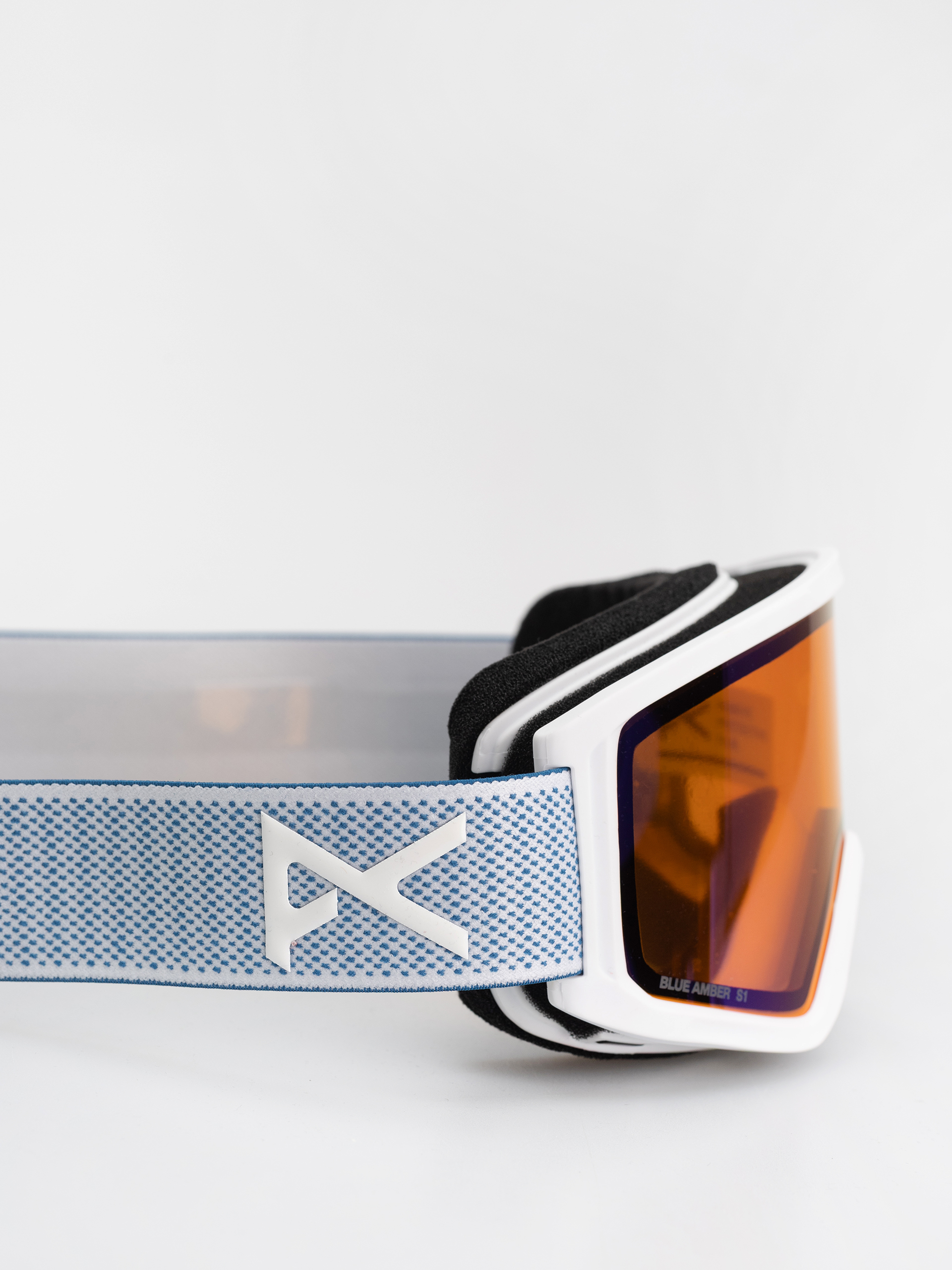 Snowboardové okuliare Anon Tracker 2.0 JR (mountain party/blue amber)