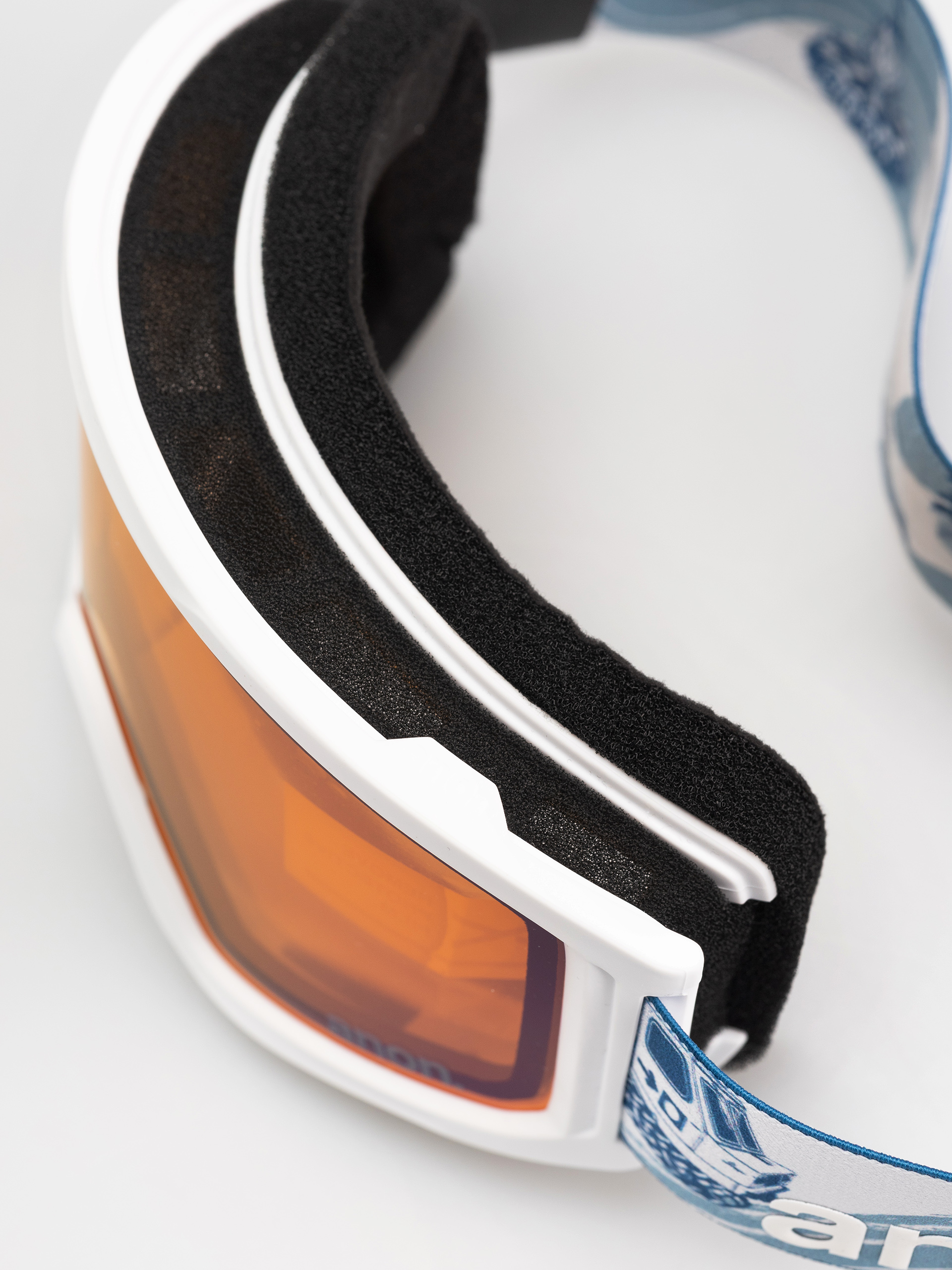 Snowboardové okuliare Anon Tracker 2.0 JR (mountain party/blue amber)