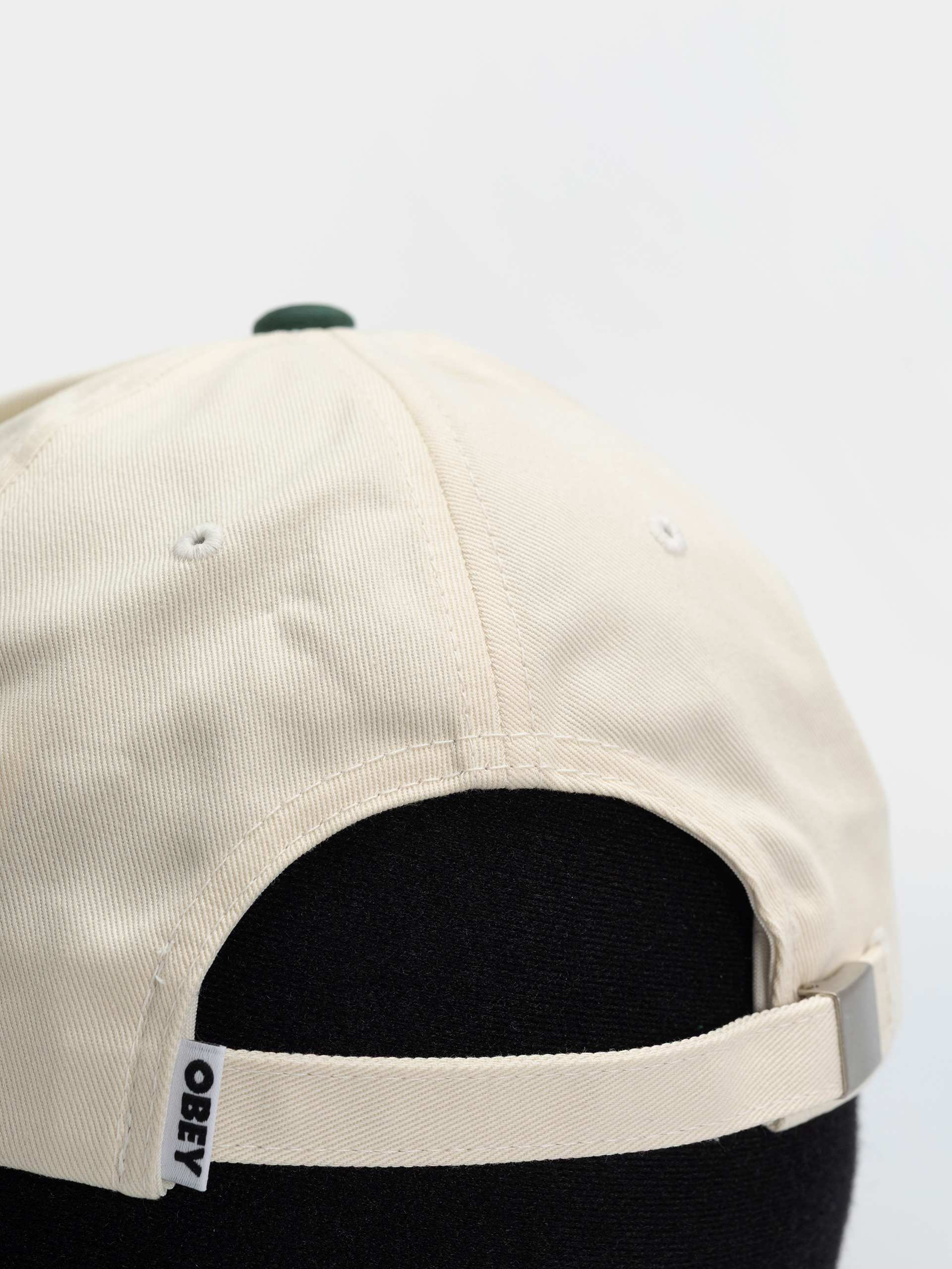 Šiltovka OBEY Design Studios 5 Panel (spruce multi)