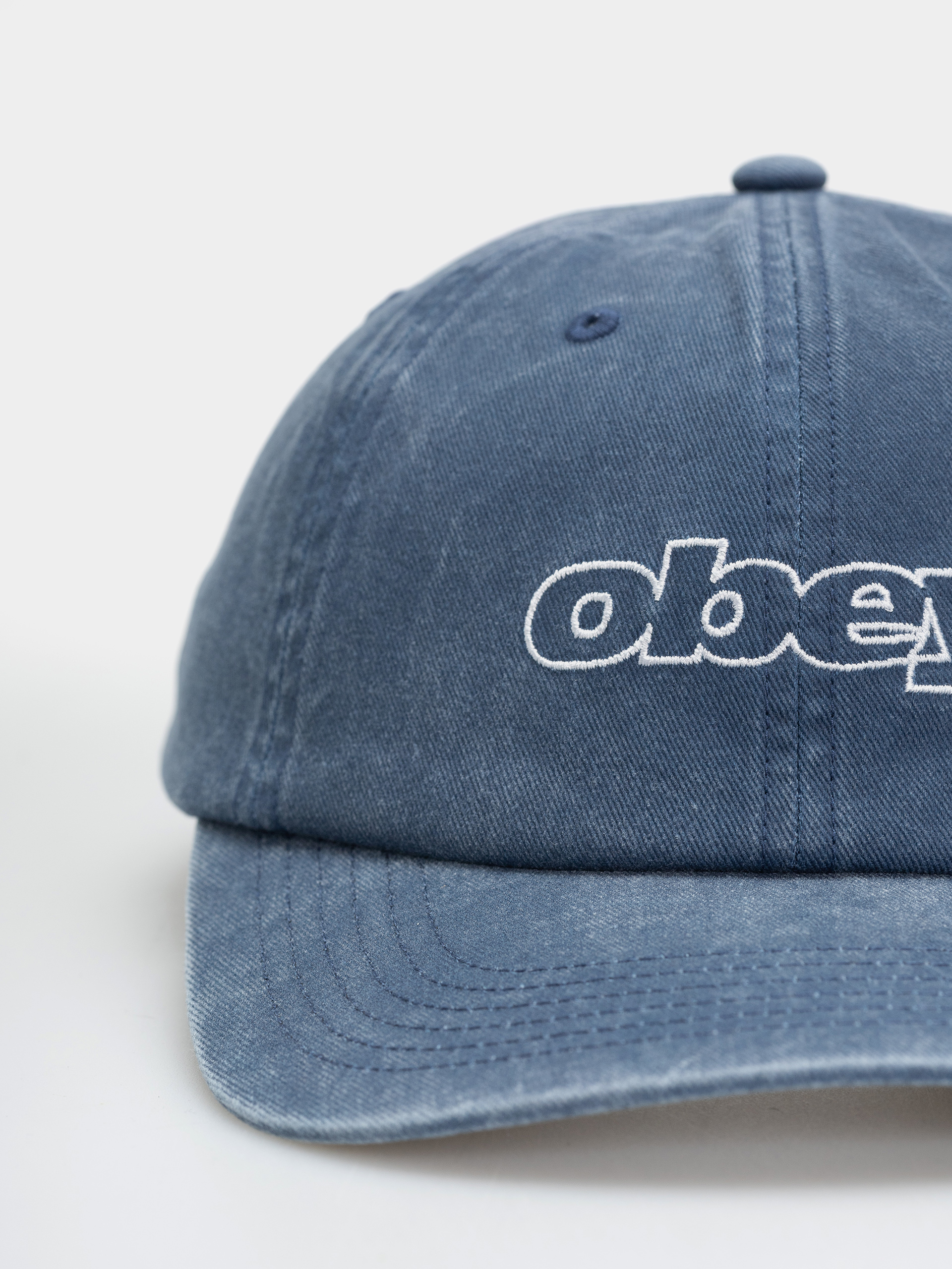 Šiltovka OBEY Pigment Slanted (pigment navy)