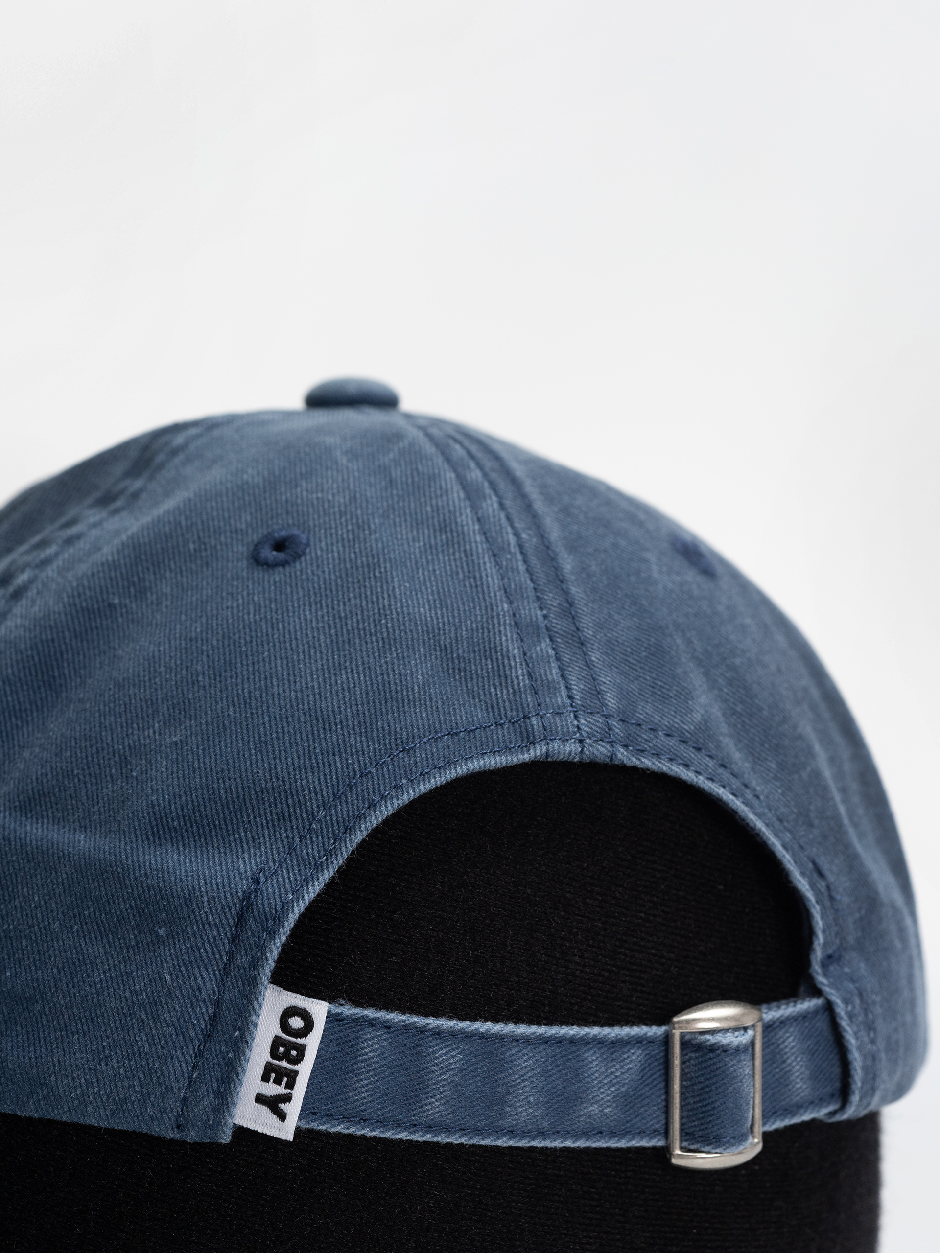 Šiltovka OBEY Pigment Slanted (pigment navy)