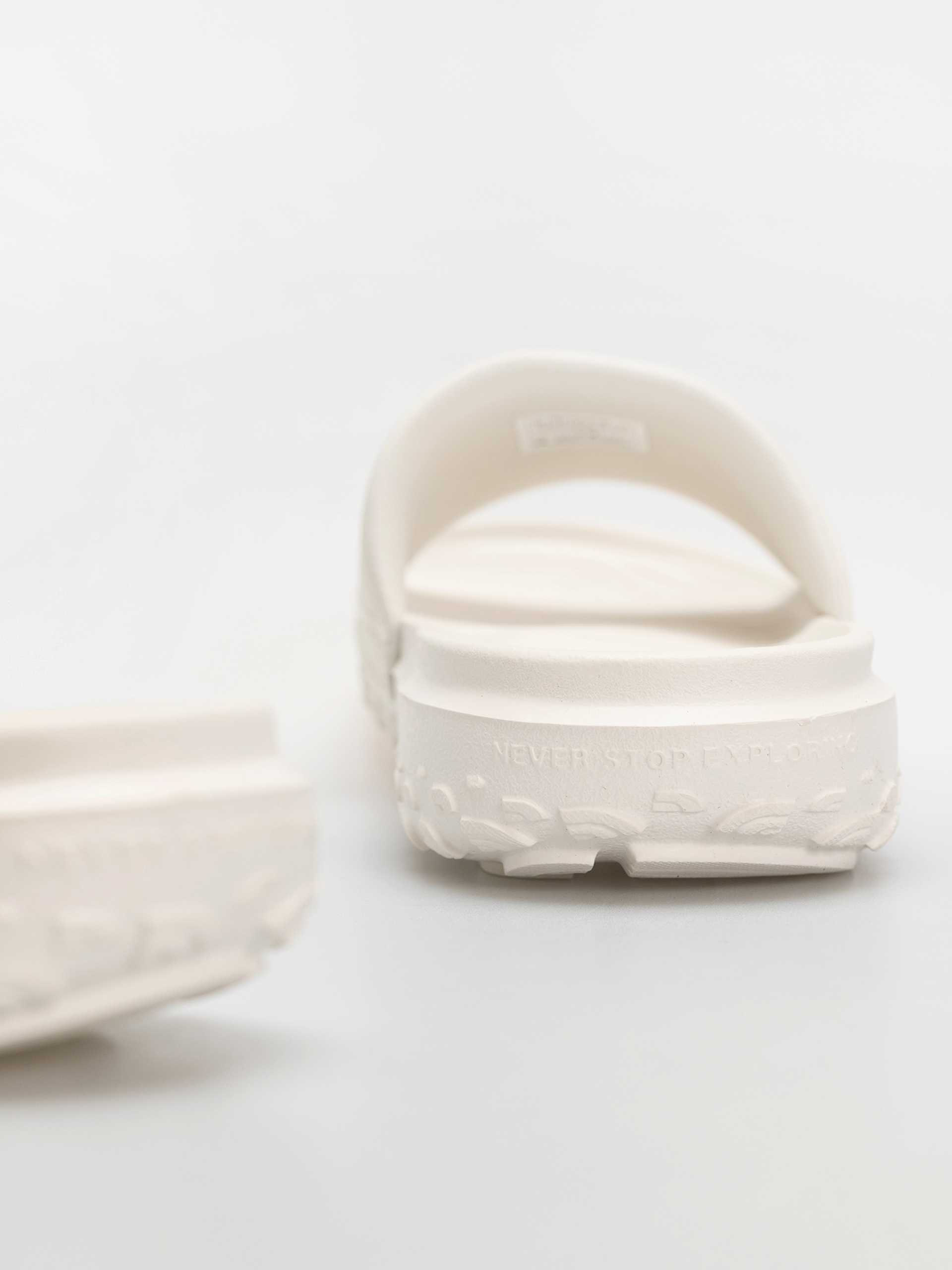 Šľapky The North Face Never Stop Cush (white dune/lava)