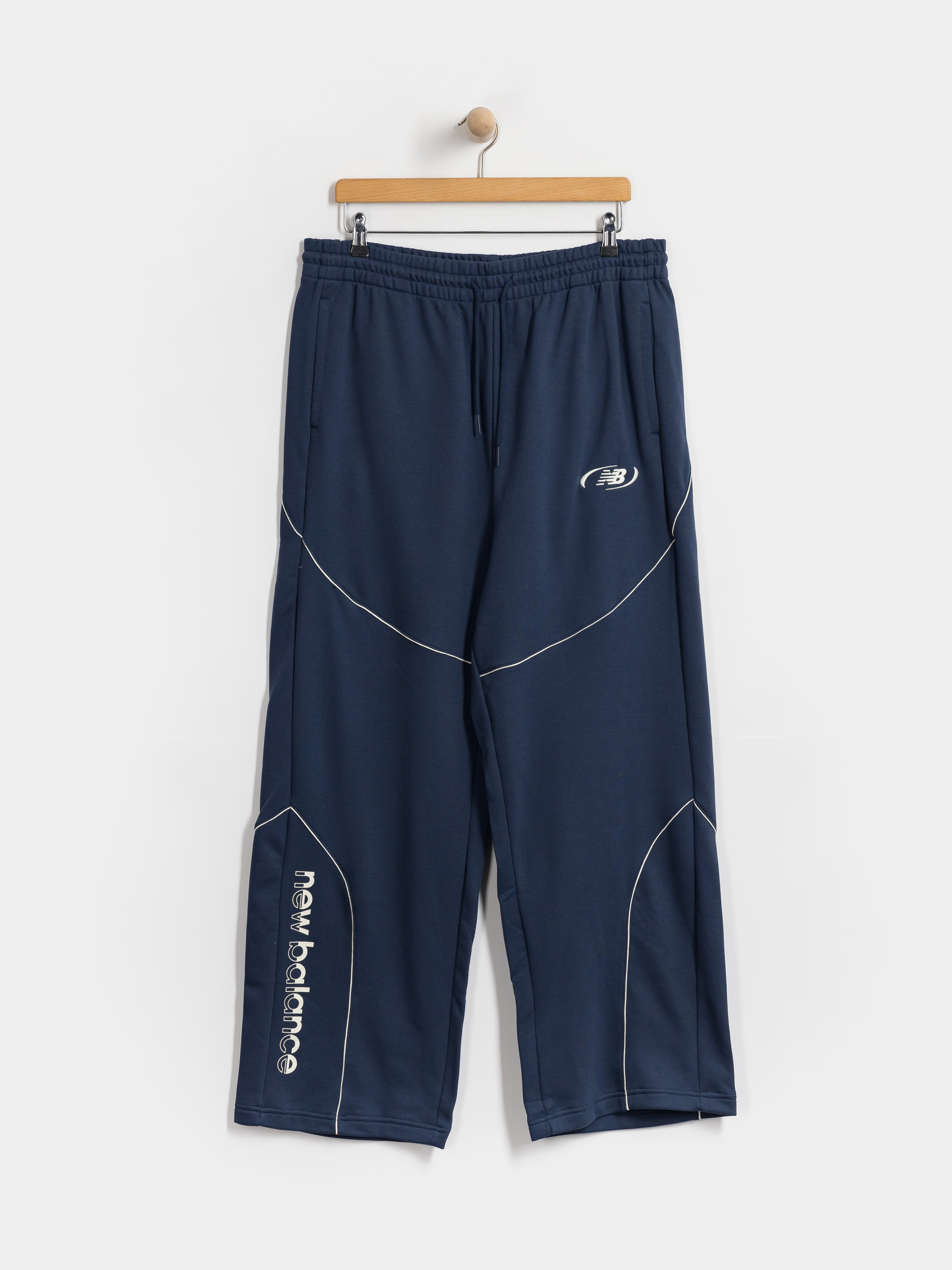Nohavice New Balance Trackside French Terry (navy)