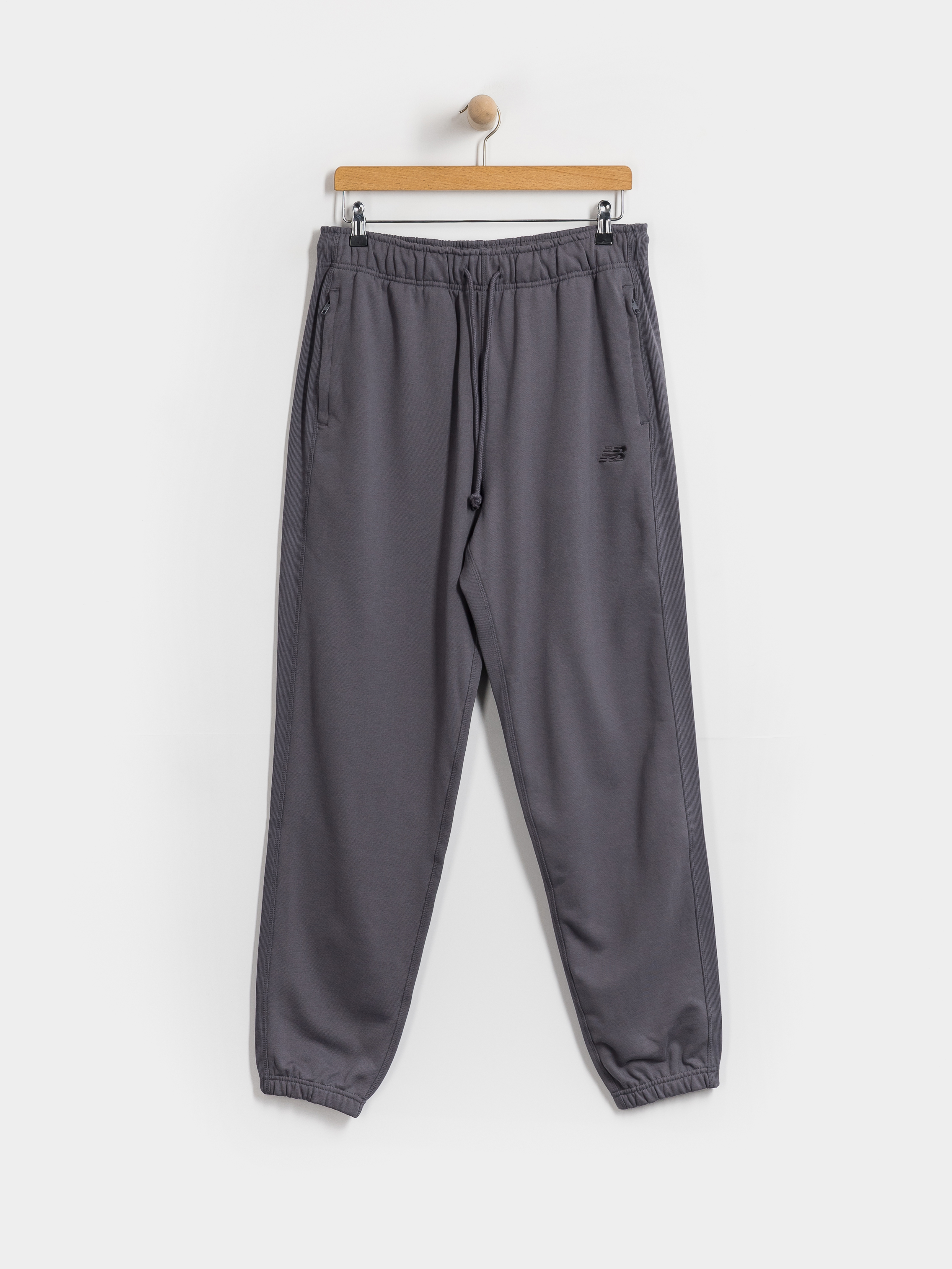 Nohavice New Balance Athletics French Terry Jogger