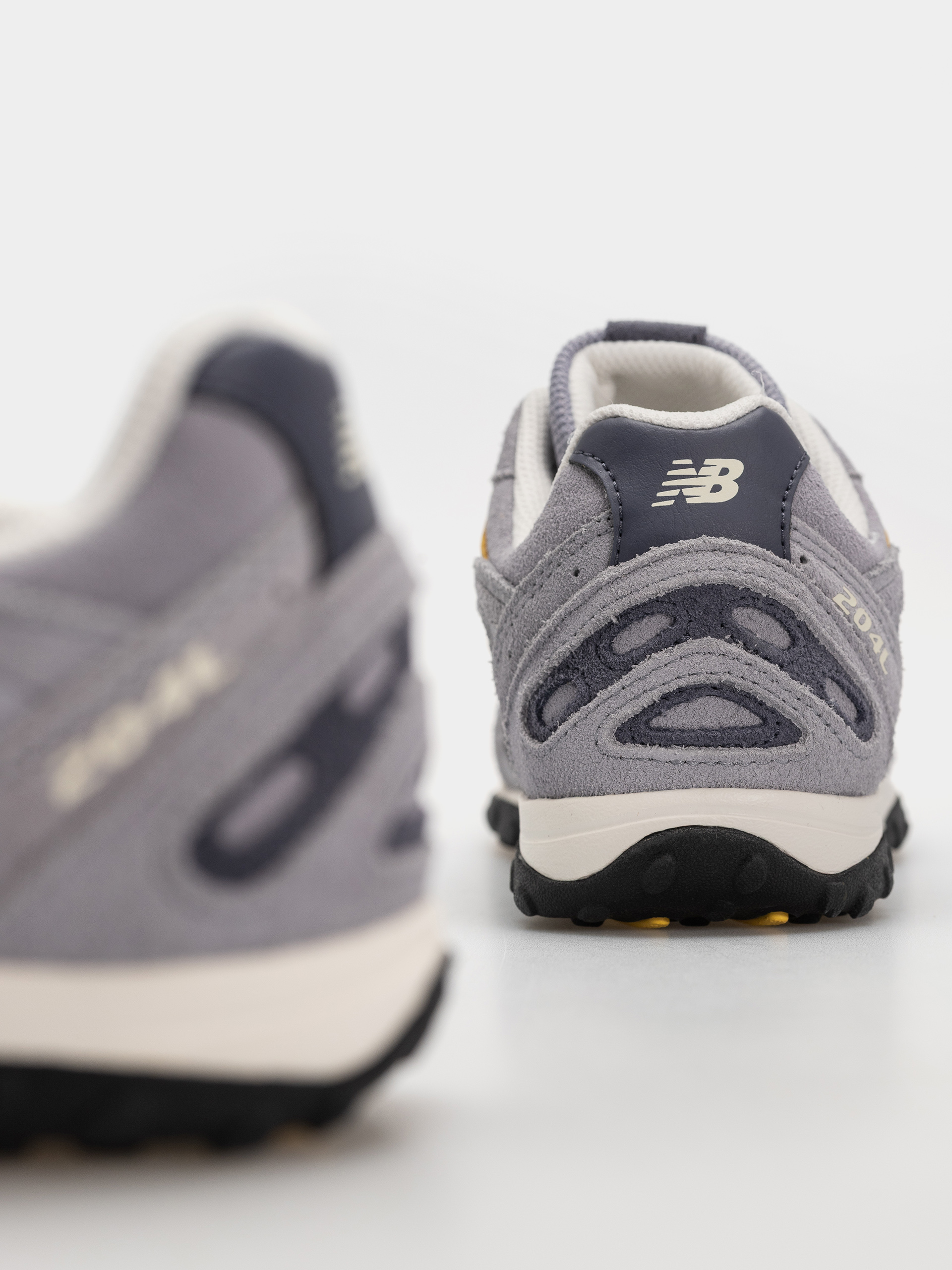 Topánky New Balance 204L (digital mist/meteorite/light mars yellow)