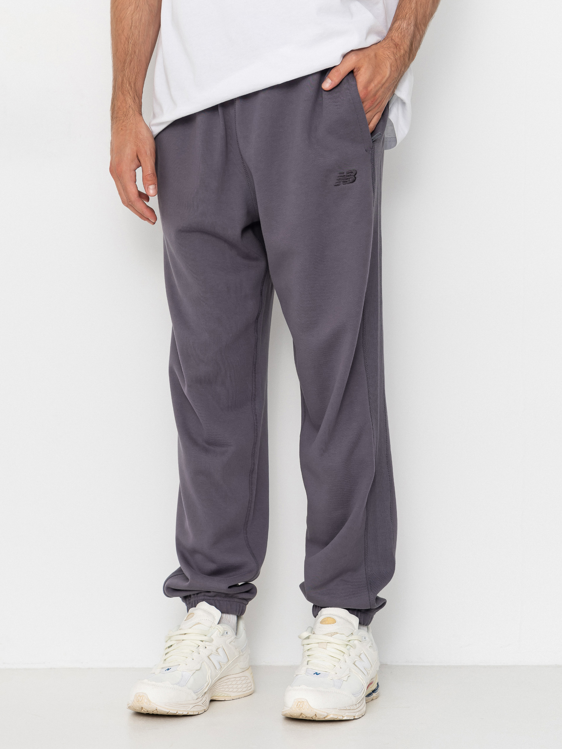 Nohavice New Balance Athletics French Terry Jogger (neptune grey)