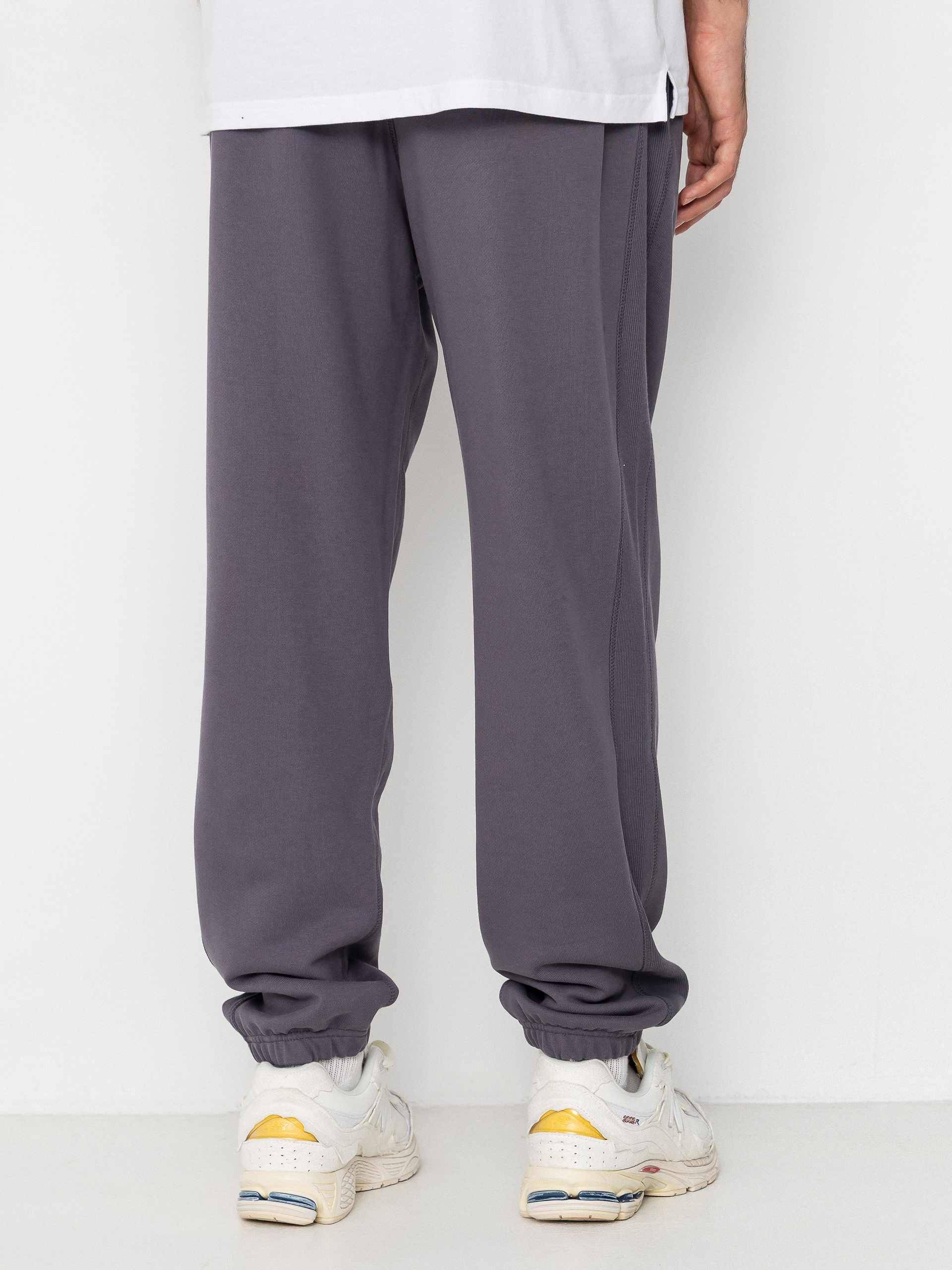 Nohavice New Balance Athletics French Terry Jogger (neptune grey)