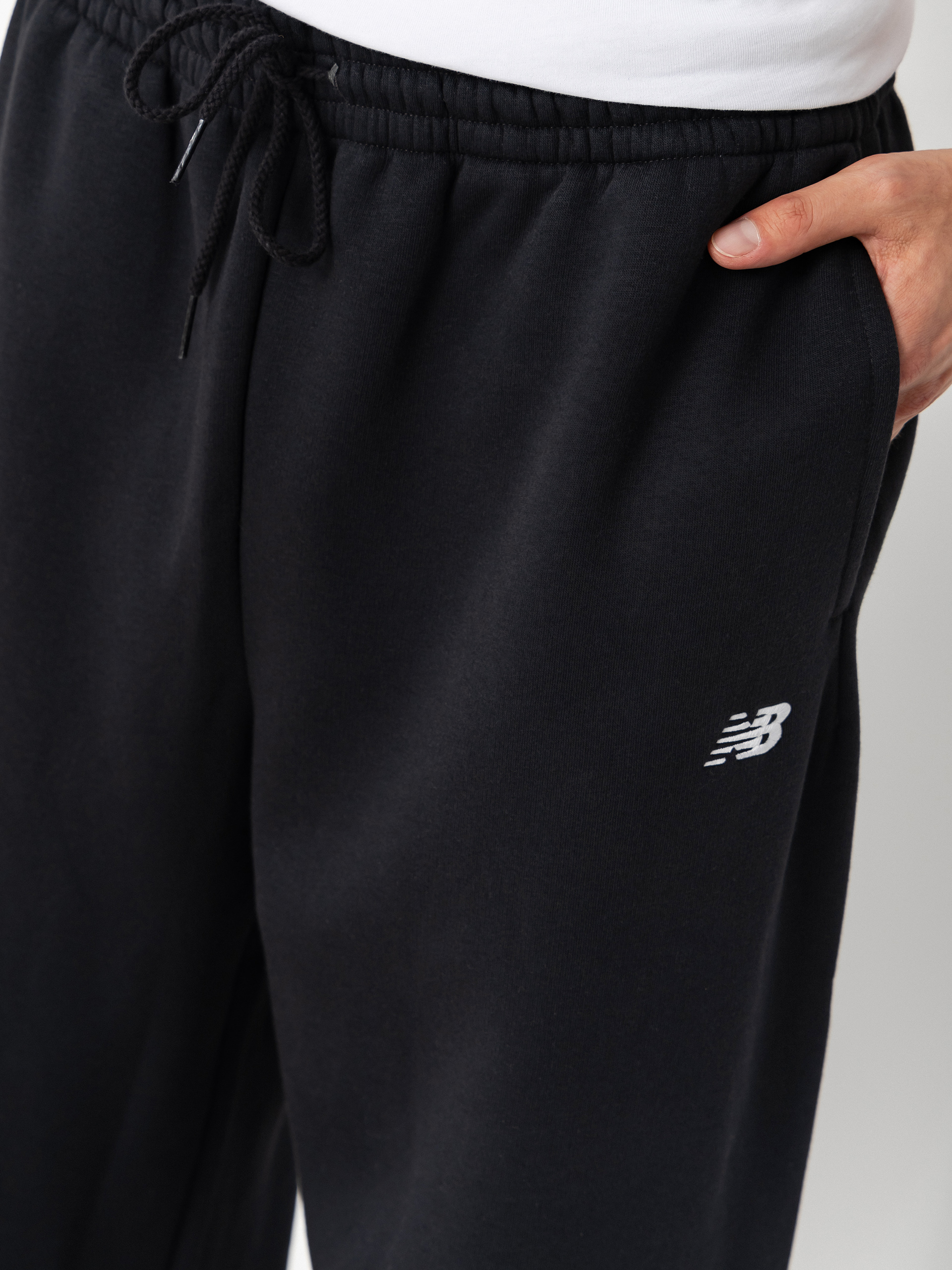 Nohavice New Balance Sport Essentials Fleece (black)
