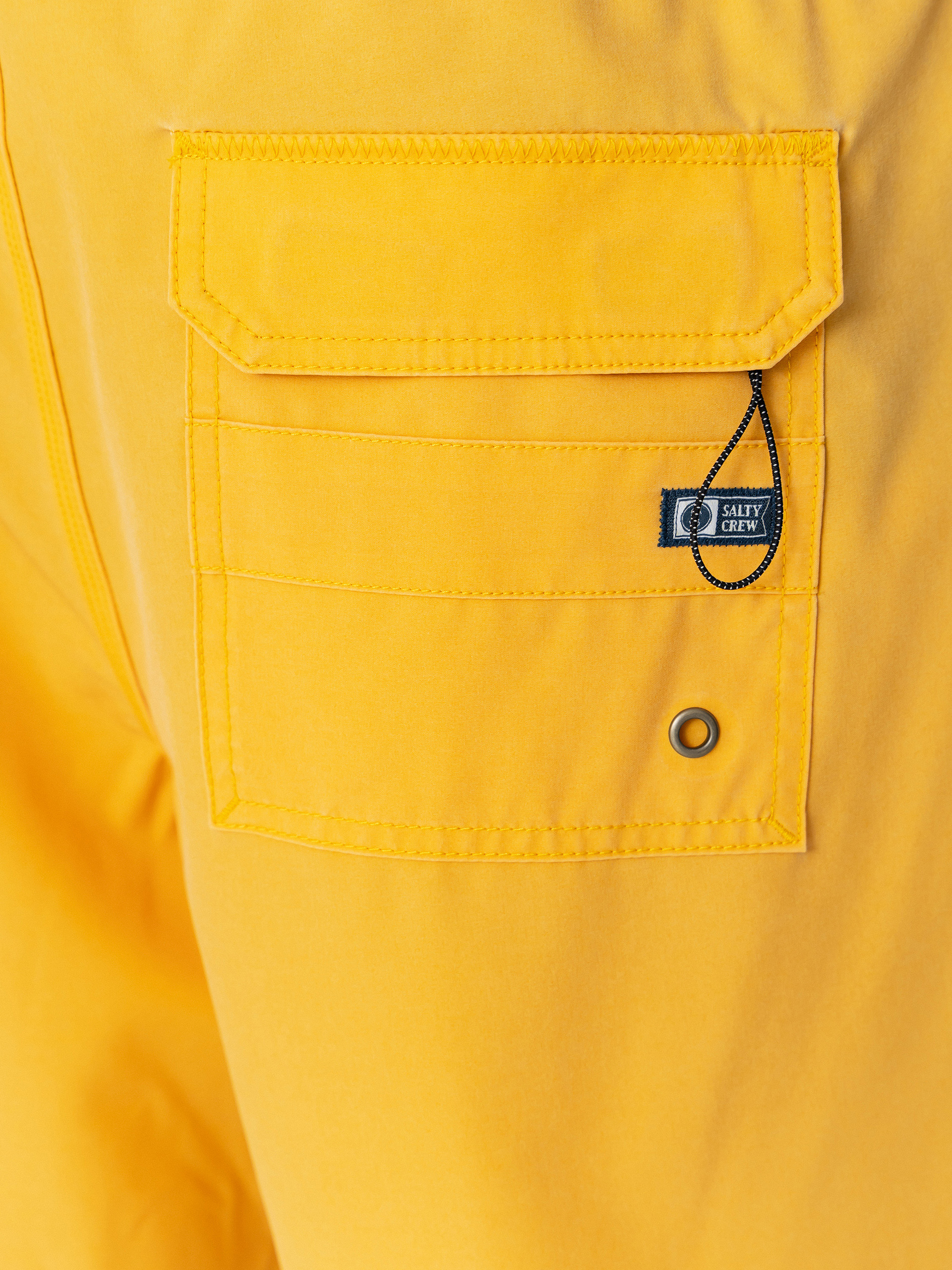 Plážové kraťasy Salty Crew Seadog Volley (mineral yellow)