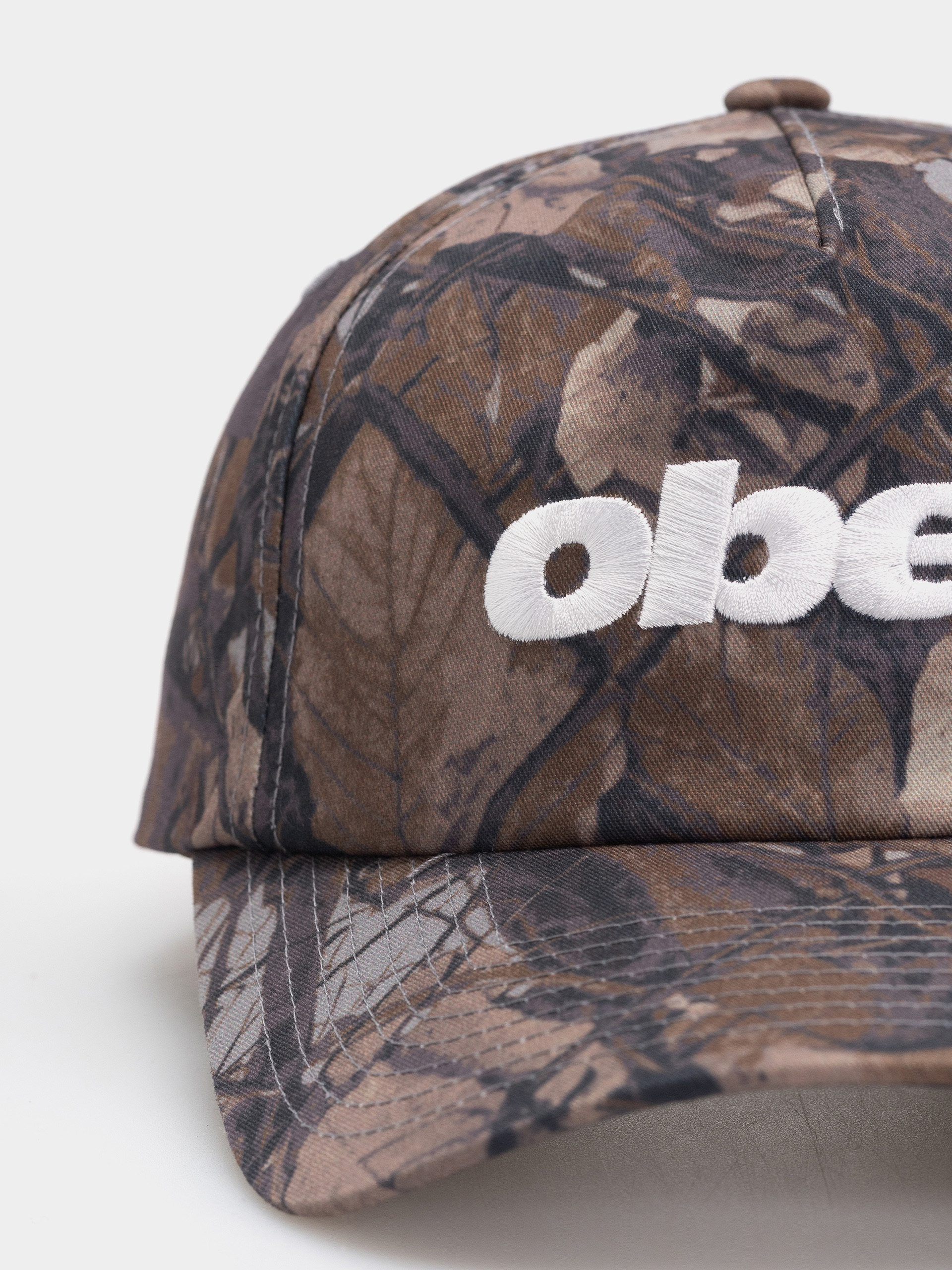 Šiltovka OBEY Delta 5 Panel (fence camo multi)