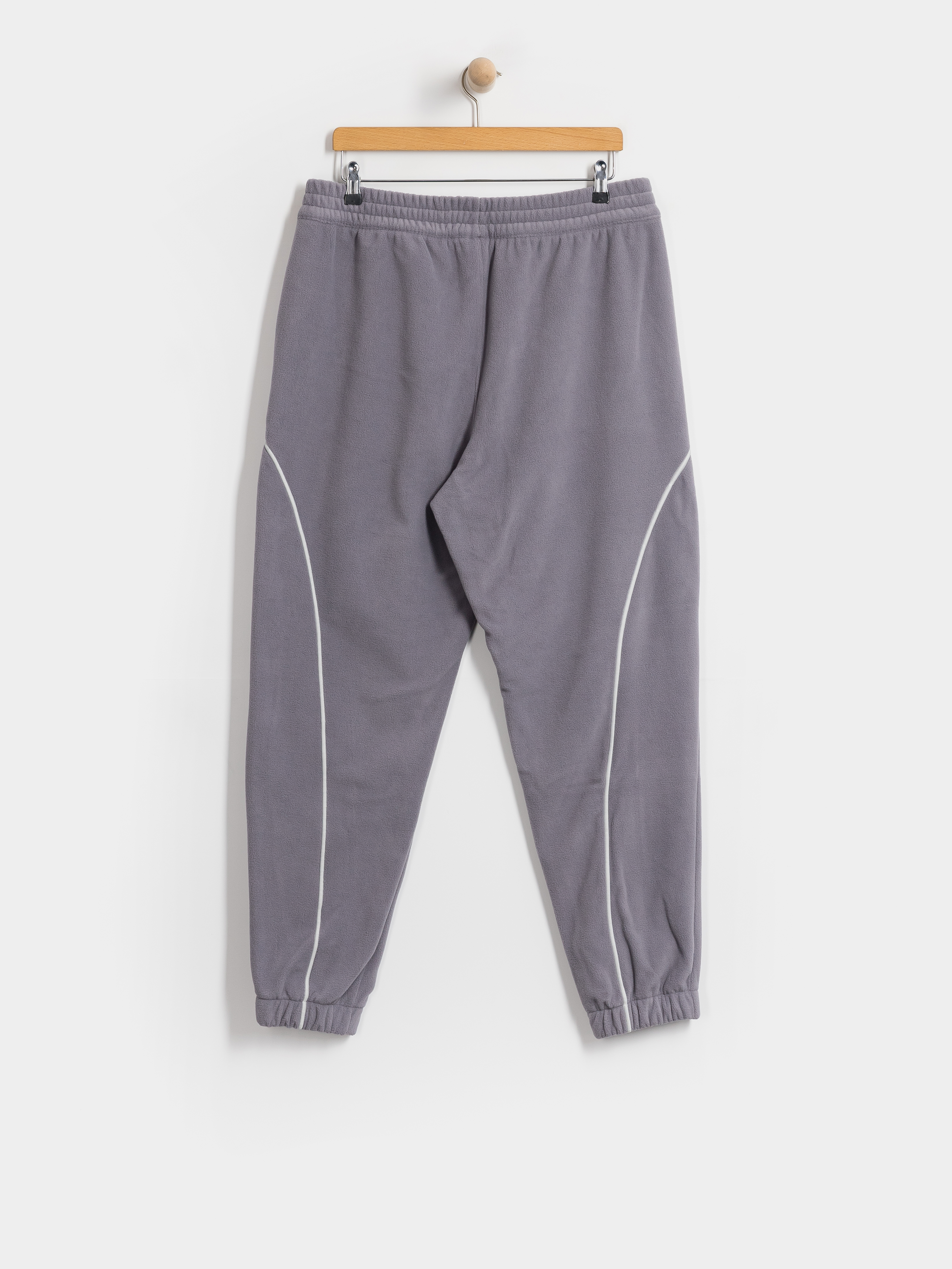 Nohavice New Balance Trackside Polar Fleece Jogger (off line grey)