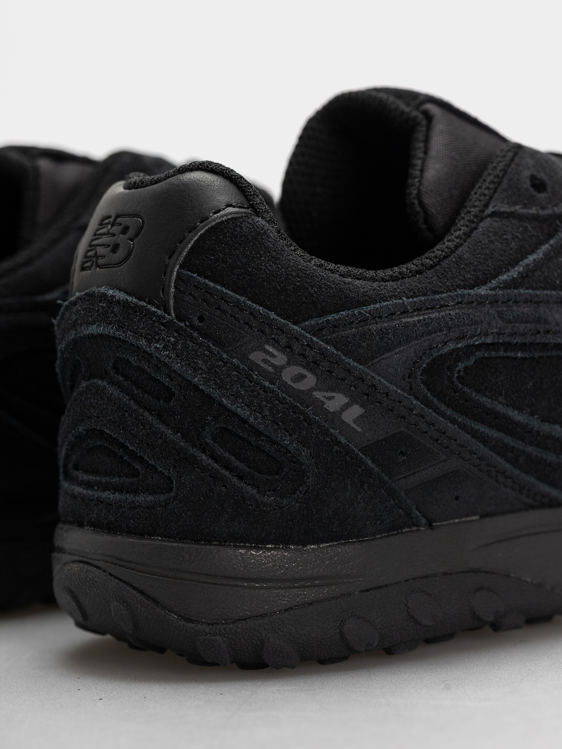 Topánky New Balance 204L (black/black cement)
