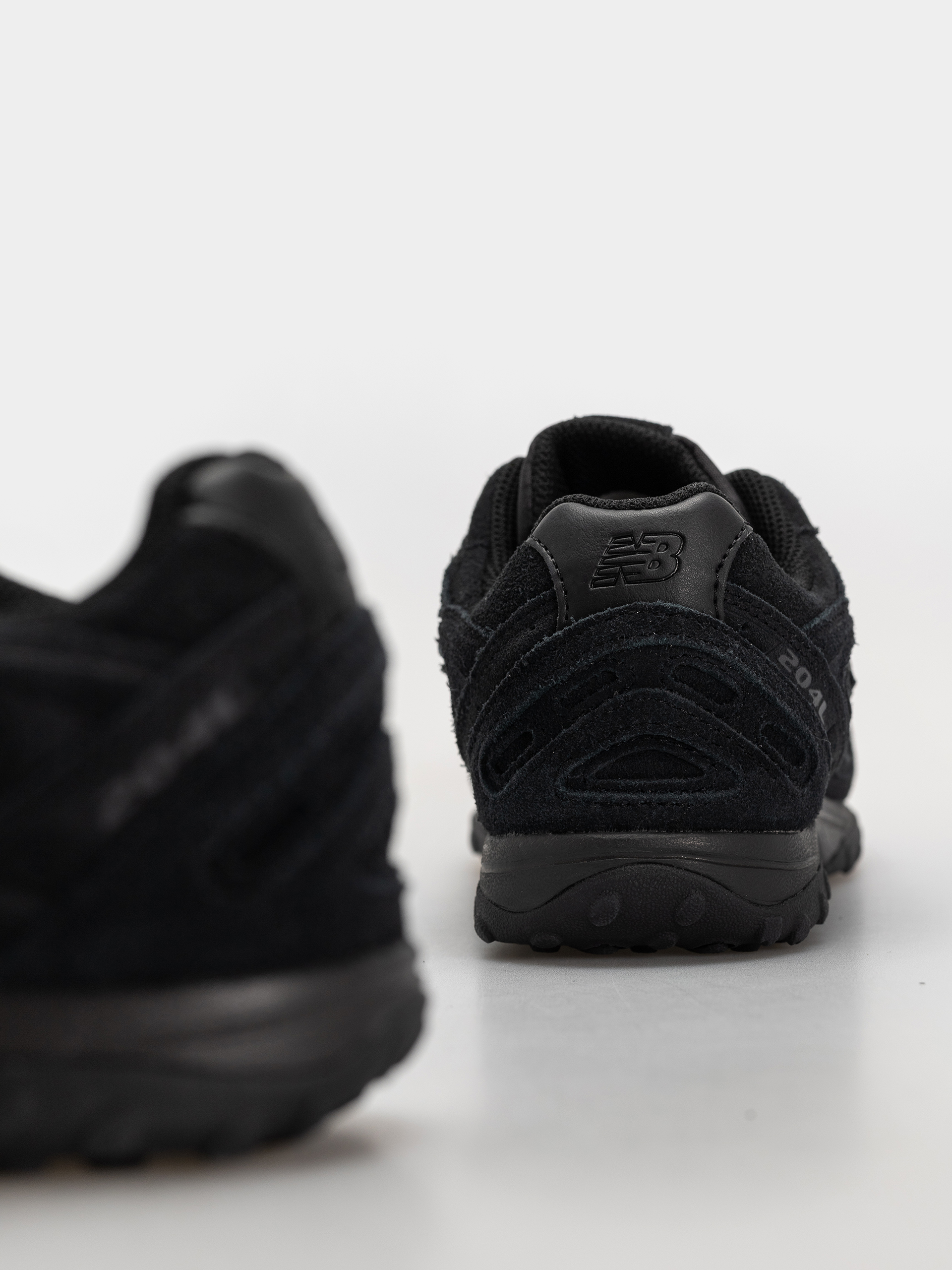 Topánky New Balance 204L (black/black cement)