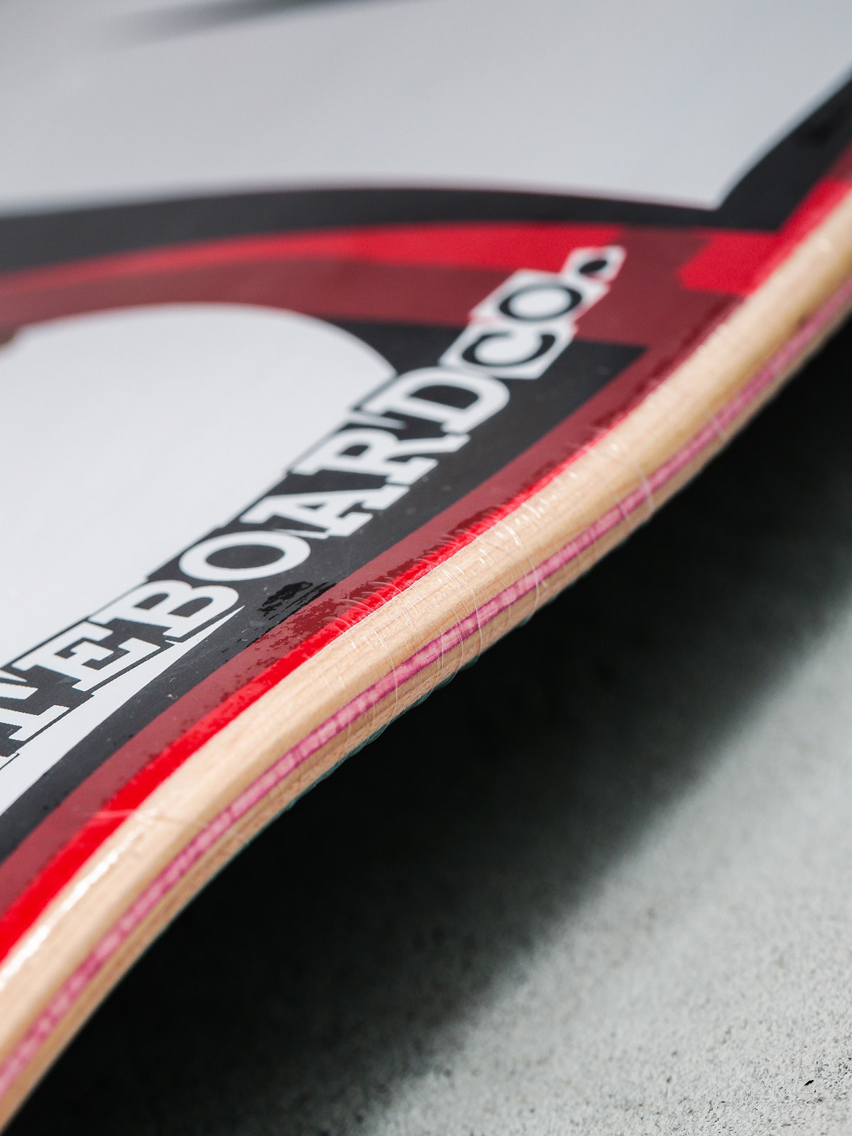 Doska Baker Brand Logo (white)